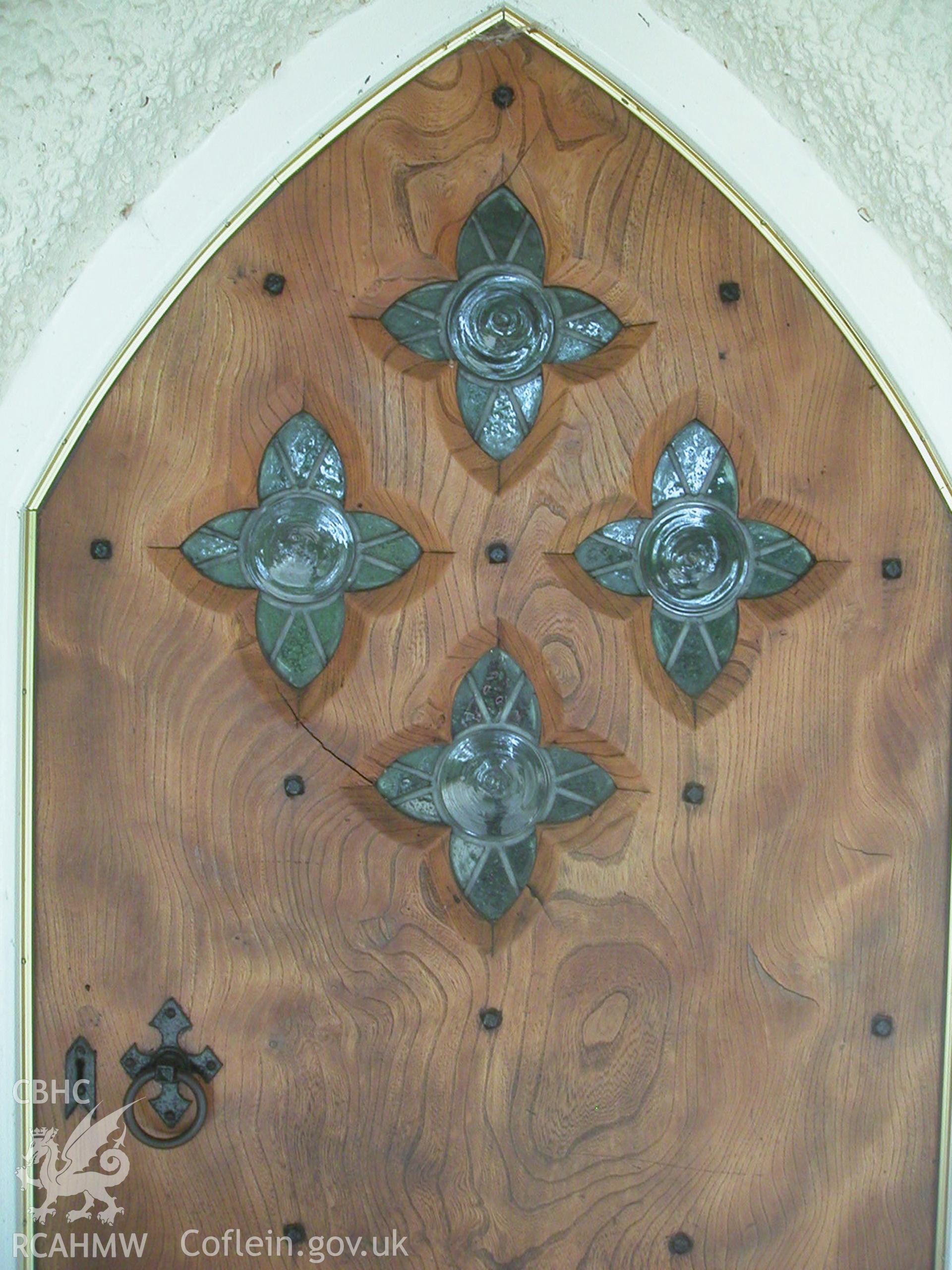 Digital image of a door at Cefn Isaf: 'Herbert Luck North. Arts and Crafts Architecture for Wales', page 45.