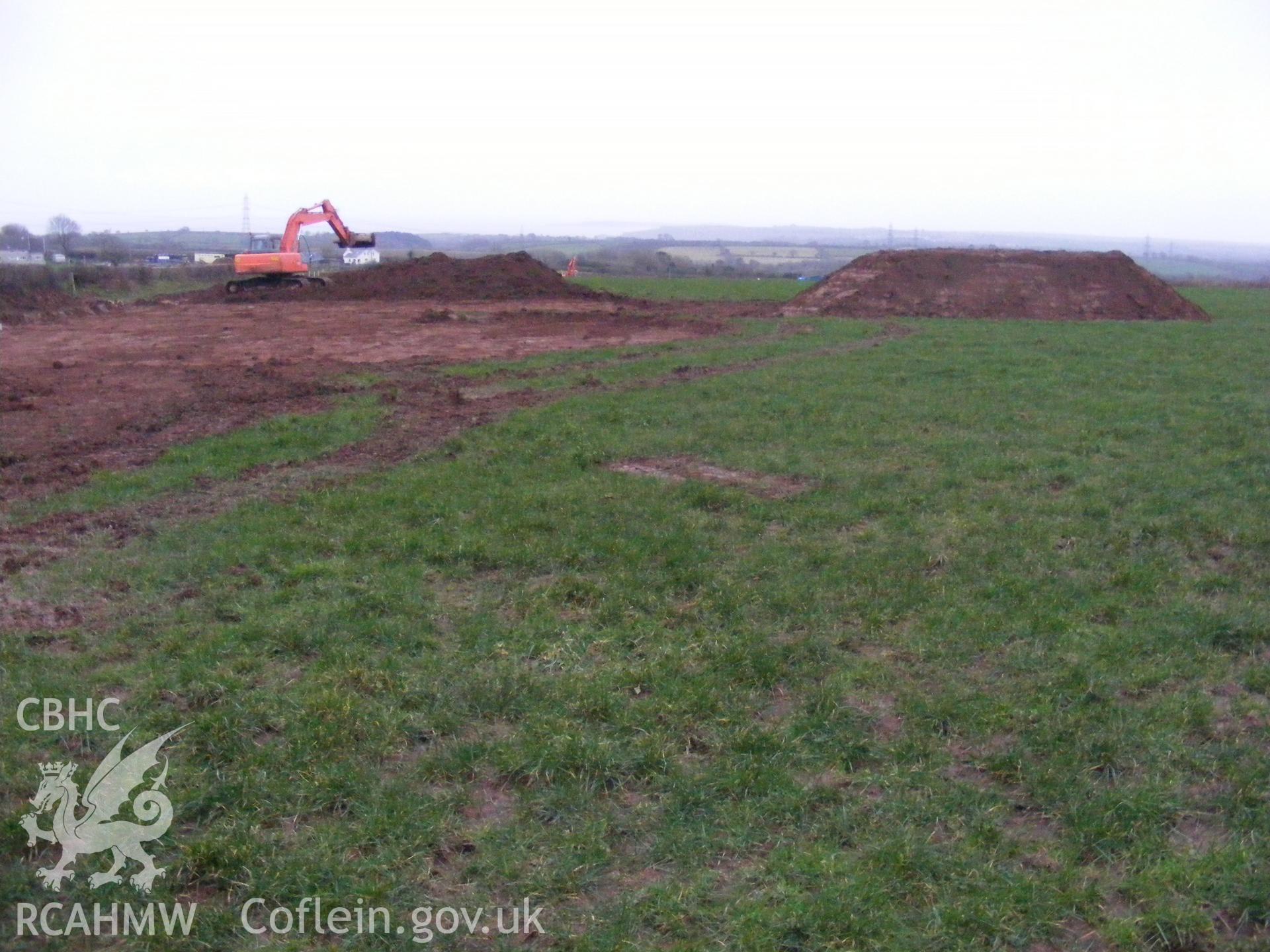 View showing general view of turbine base 1 facing south, taken at archaeological watching brief at Princes Gate Spring Water, produced by Headland Archaeology (UK) Ltd., 2014.