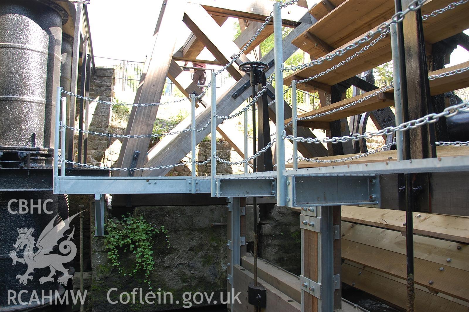 Digital image relating to Melingriffith Water Pump: Walkway support steelwork fixed to sluice gate frame and masonry wall.