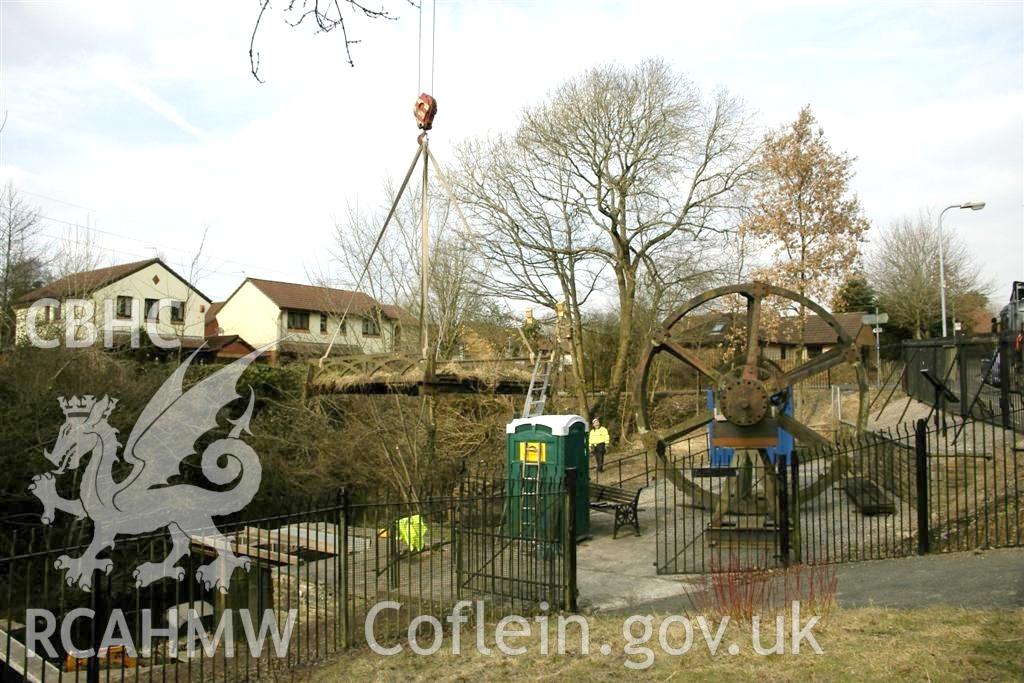Digital image relating to Melingriffith Water Pump: Original tow-path bridge being lifted from wasteland into site enclosure.