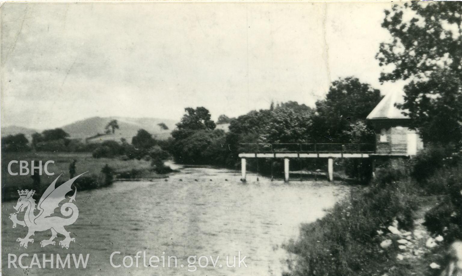 Digitised photograph of view of old sluices on edge of lake Bala, taken from the west (Lake Bala side). Scanned from an original held by the Environment Agency.