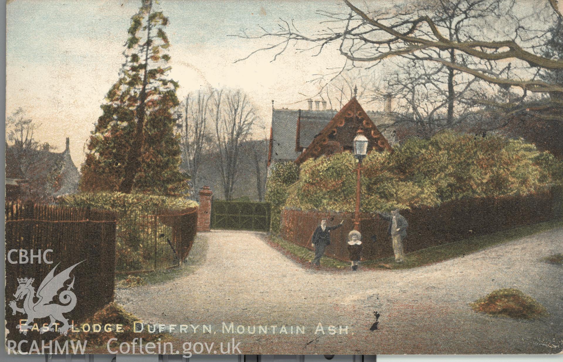 Digitised postcard image of east lodge at Dyffryn House, Mountain Ash, with figures, Meredith, Mountain Ash. Produced by Parks and Gardens Data Services, from an original item in the Peter Davis Collection at Parks and Gardens UK. We hold only web-resolution images of this collection, suitable for viewing on screen and for research purposes only. We do not hold the original images, or publication quality scans.
