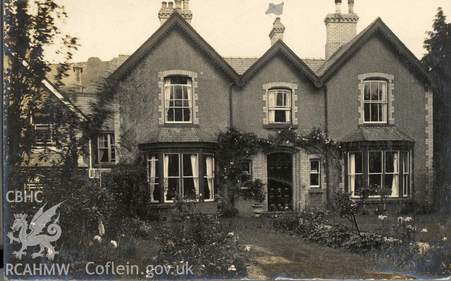 Digitised postcard image of unidentified house, Llanfairfechan, Fenter and Son, Llanfairfechan. Produced by Parks and Gardens Data Services, from an original item in the Peter Davis Collection at Parks and Gardens UK. We hold only web-resolution images of this collection, suitable for viewing on screen and for research purposes only. We do not hold the original images, or publication quality scans.