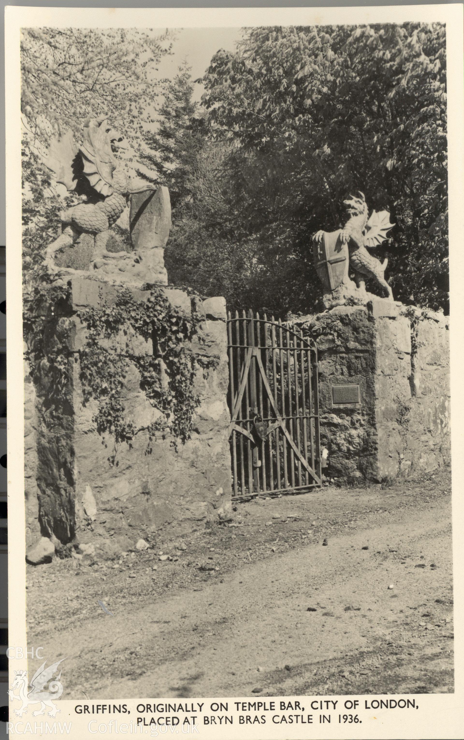 Digitised postcard image of Bryn Bras Castle entrance, Llanrug, with griffin gateposts. Produced by Parks and Gardens Data Services, from an original item in the Peter Davis Collection at Parks and Gardens UK. We hold only web-resolution images of this collection, suitable for viewing on screen and for research purposes only. We do not hold the original images, or publication quality scans.