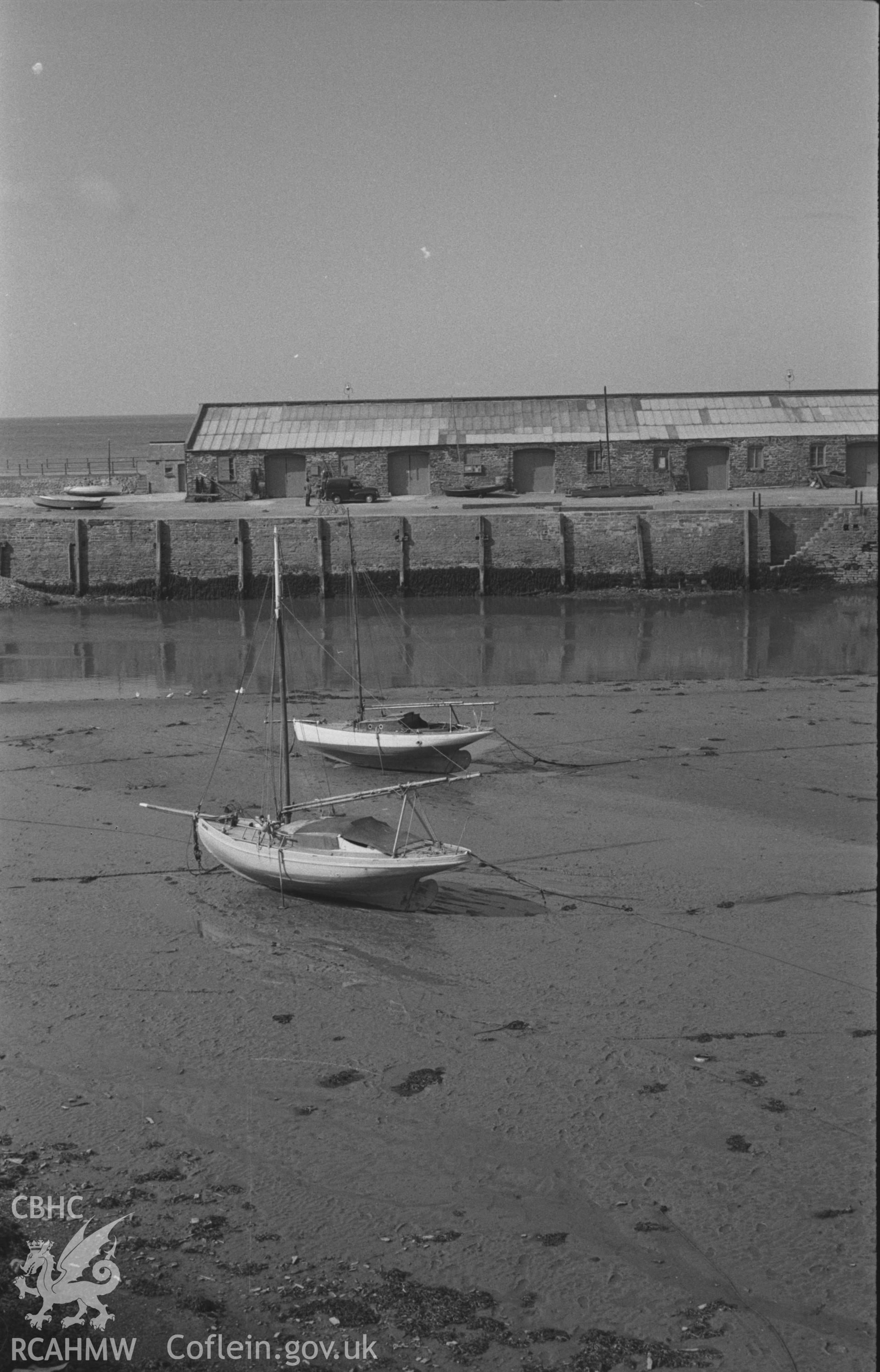 Black and White photograph showing the quay and boats at Aberystwyth Harbour, viewed from Pen-yr-Angor. Photographed by Arthur Chater in March 1961, from Grid Reference SN 5815 8104, looking west.