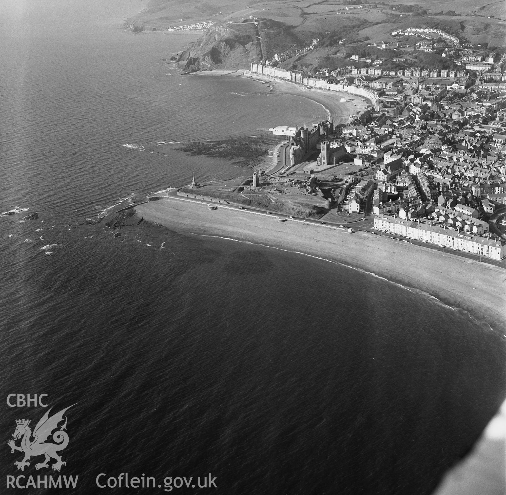 RCAHMW Black and white oblique aerial photograph of Aberystwyth Castle, taken by CR Musson on 24/06/88