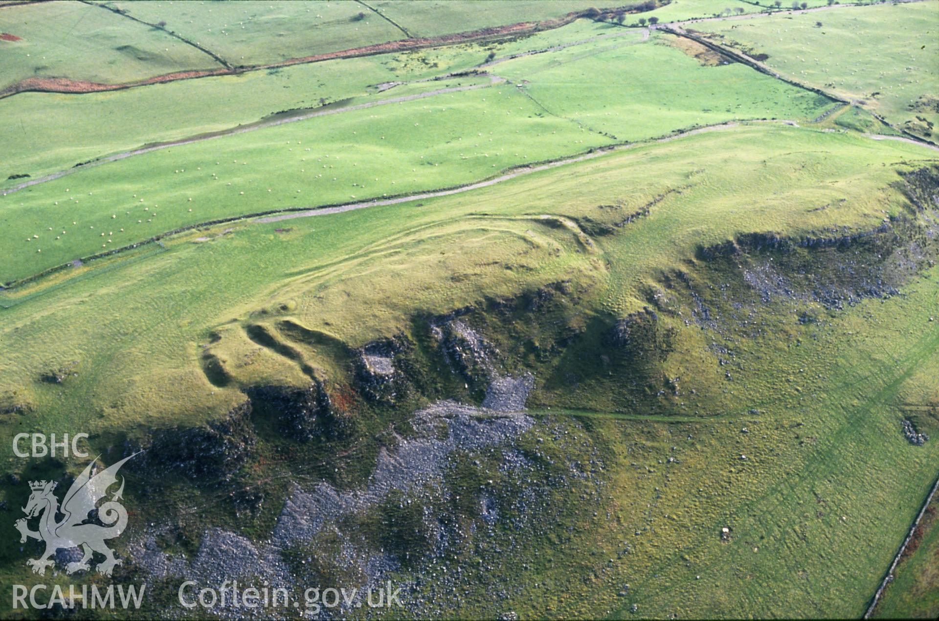 Slide of RCAHMW colour oblique aerial photograph of Pen-y-ffrwyd Llwyd Camp,  Craig Ystradmeurig, N. Of Ystradmeurig, taken by C.R. Musson, 29/10/1992.
