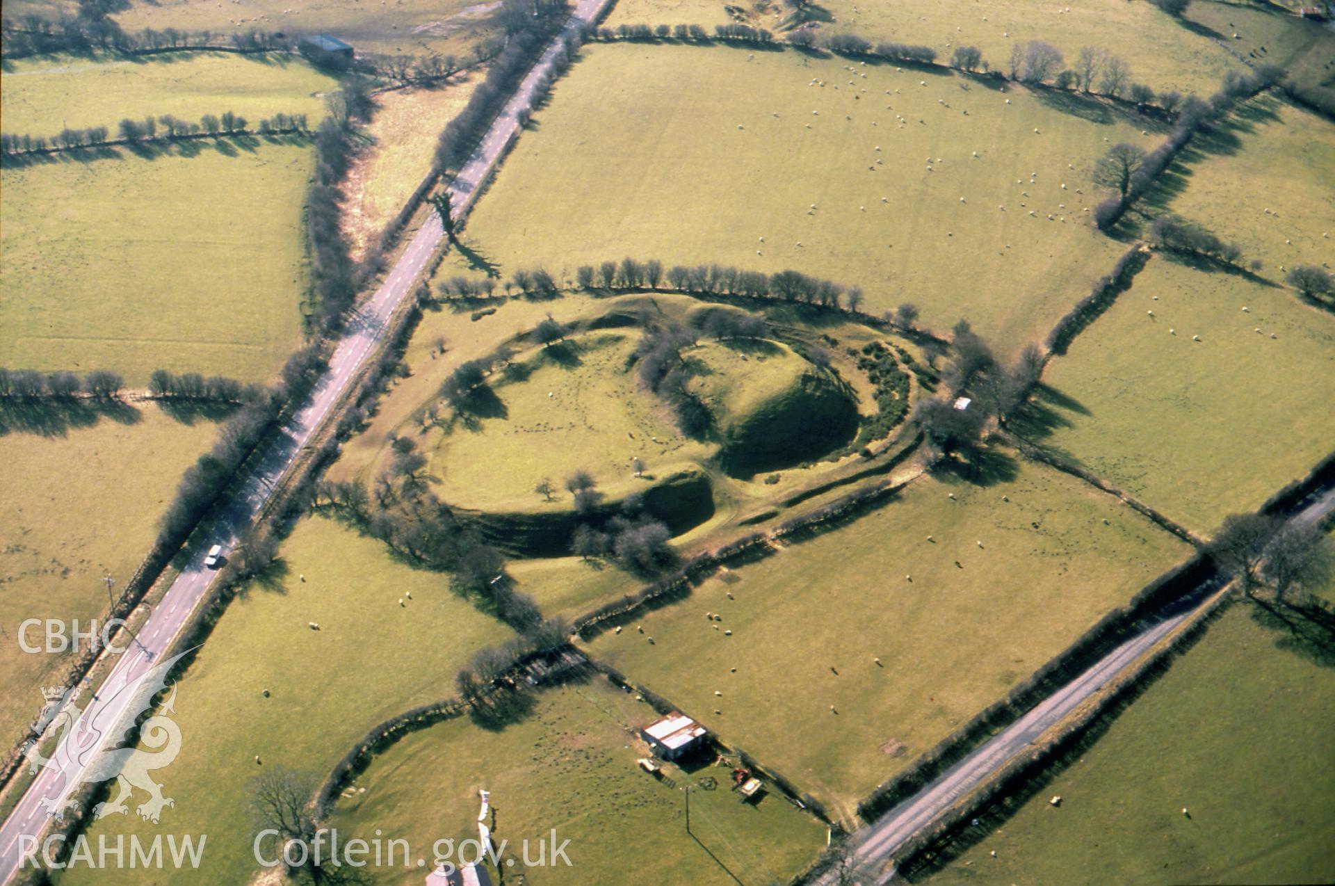 Slide of RCAHMW colour oblique aerial photograph of Tomen-y-rhodwydd;castell Yr Adwy;castell-y-rhodwydd, taken by C.R. Musson, 26/2/1991.