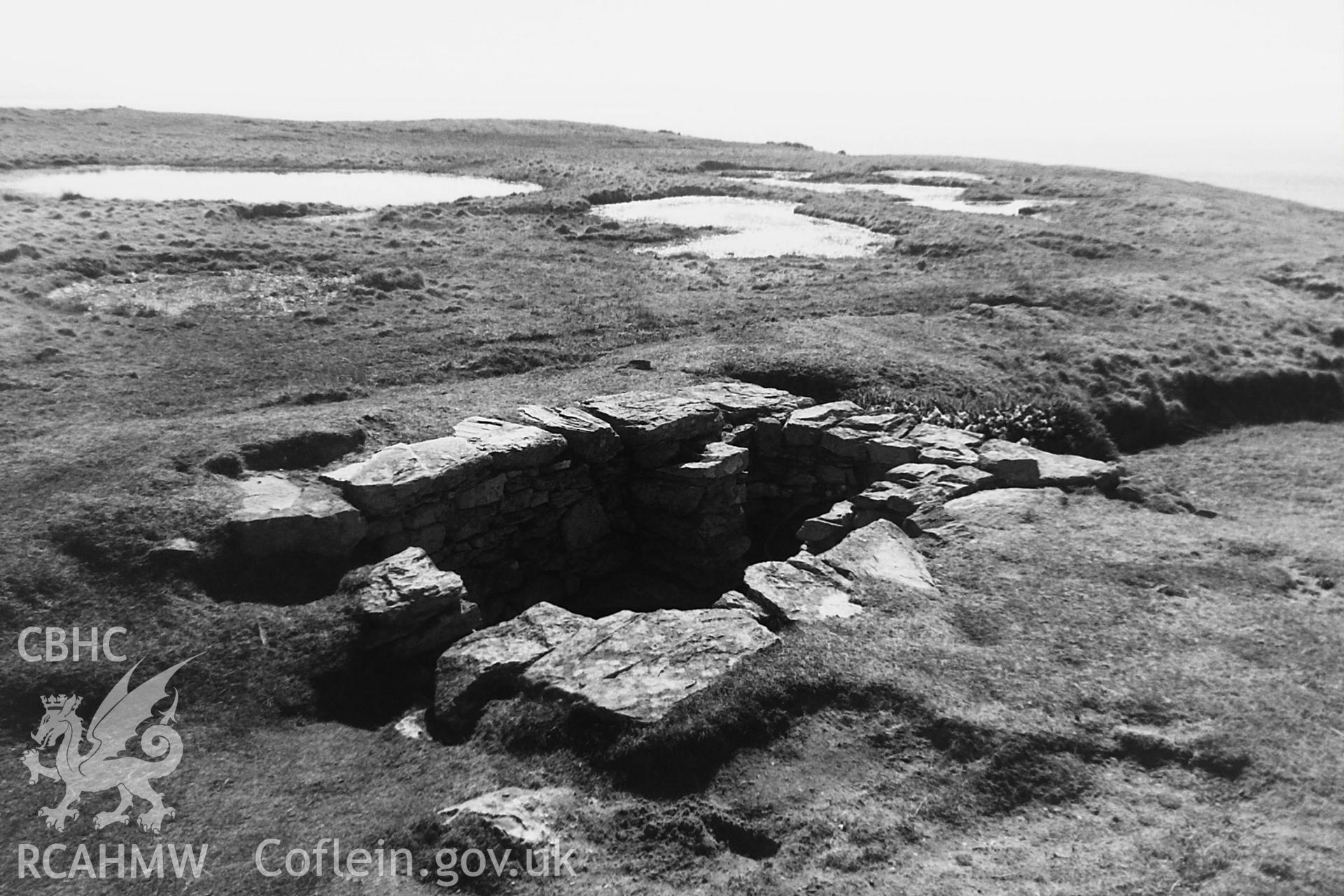Black and white photo showing St Gwenfaen's Well, taken by Paul R. Davis, undated.