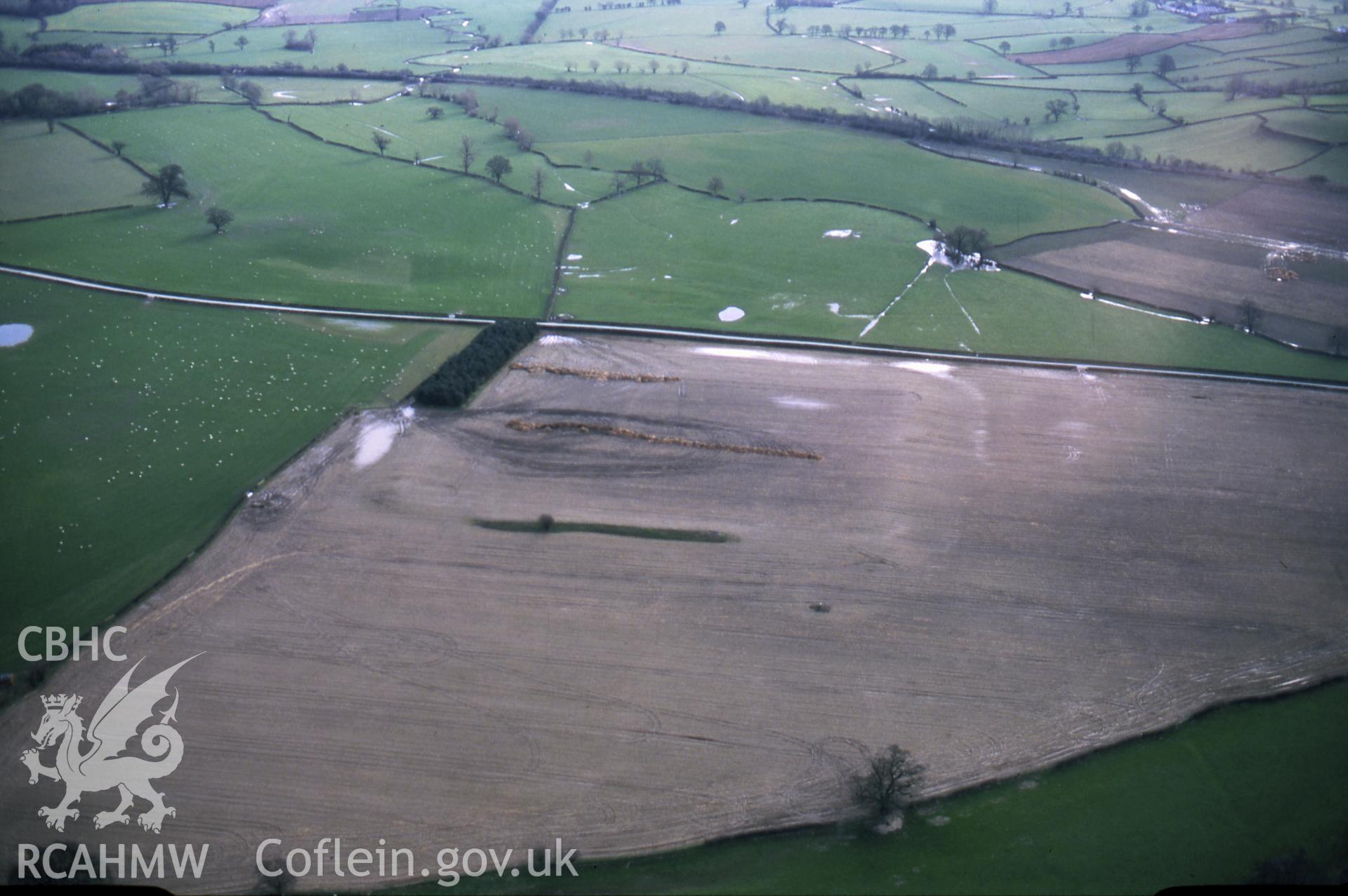 RCAHMW colour slide oblique aerial photograph of Forden Gaer, taken on 14/03/1999 by CR Musson