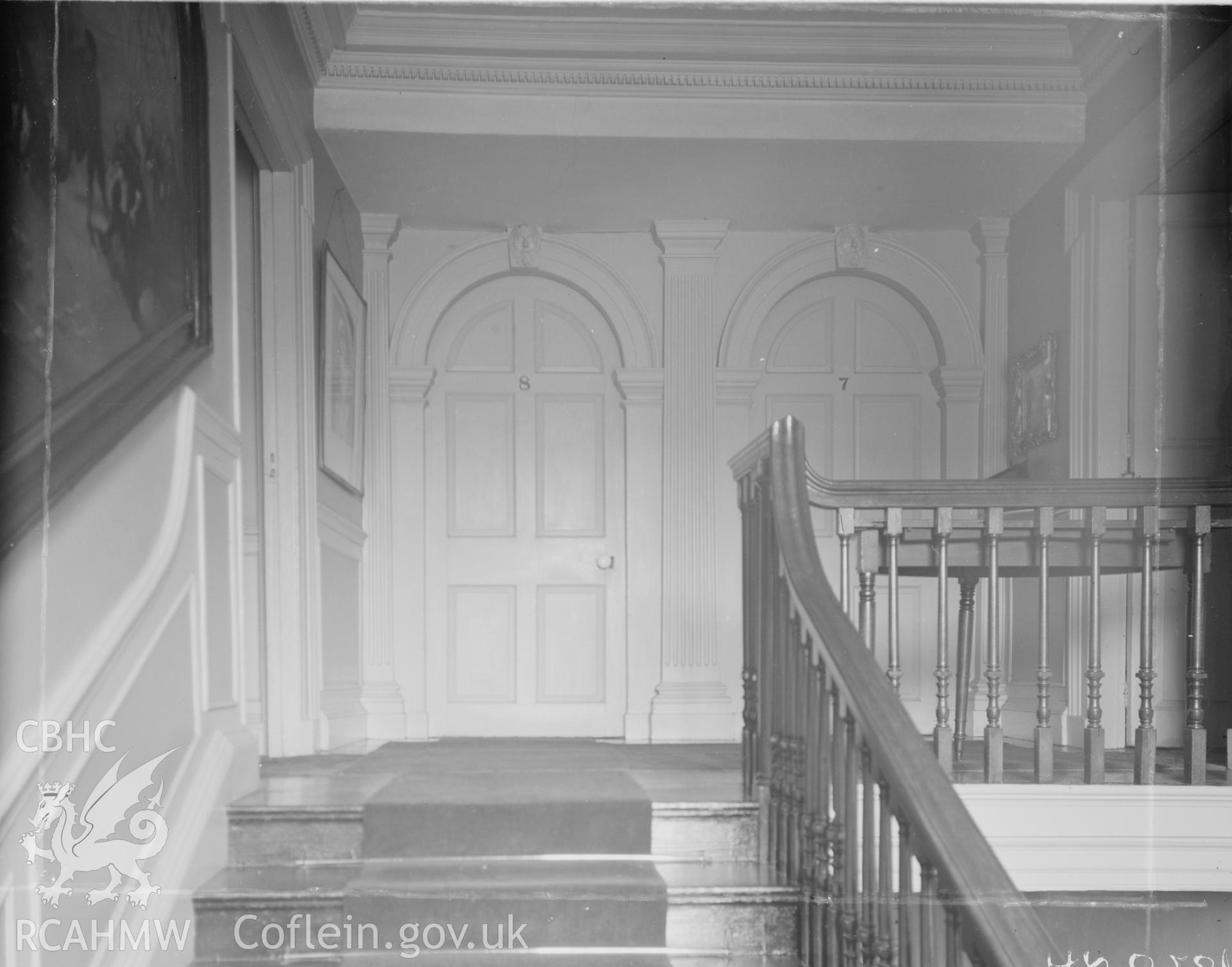 View of staircase and 1st floor doorways