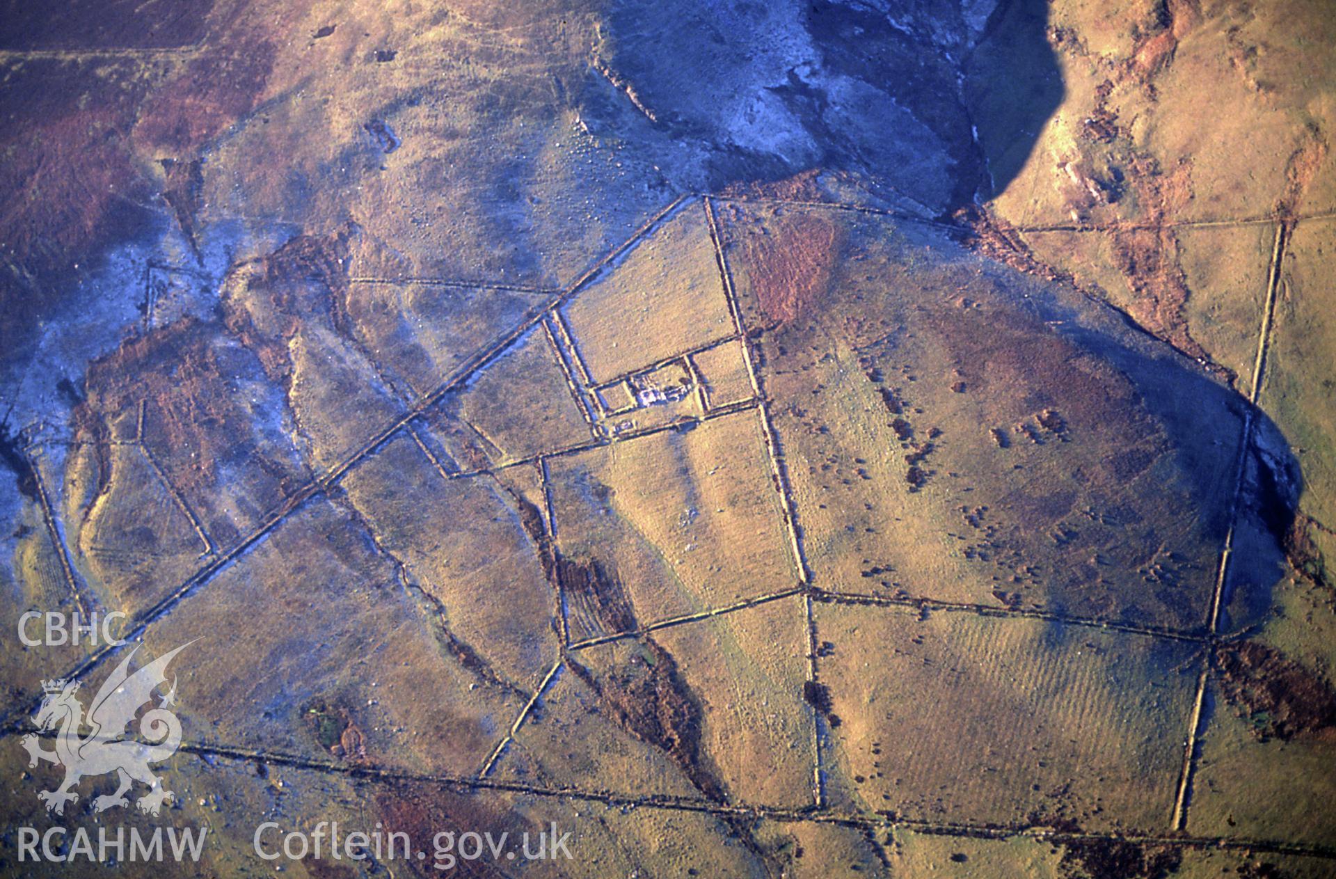 Slide of RCAHMW colour oblique aerial photograph of Waun Clyn-coch Farmstead, taken by C.R. Musson, 15/12/1990.