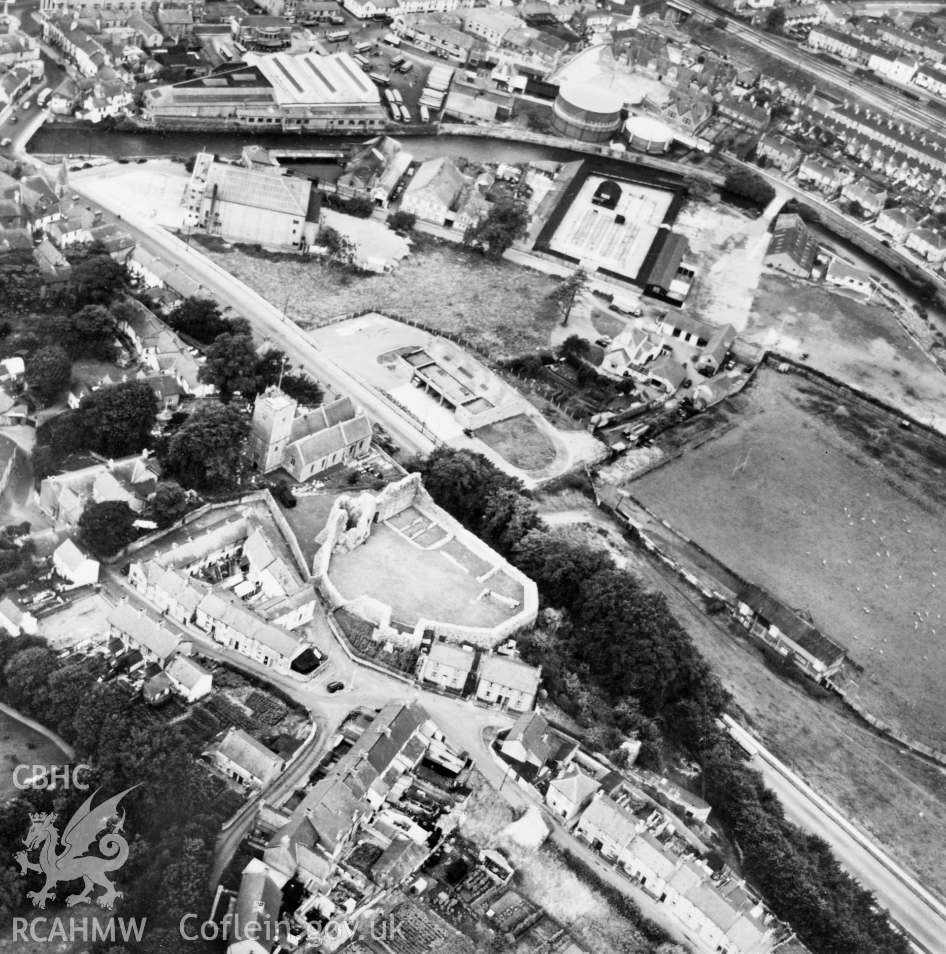 View of Bridgend showing castle and St Illtyd's church (reversed). Oblique aerial photograph, 5?" cut roll film.