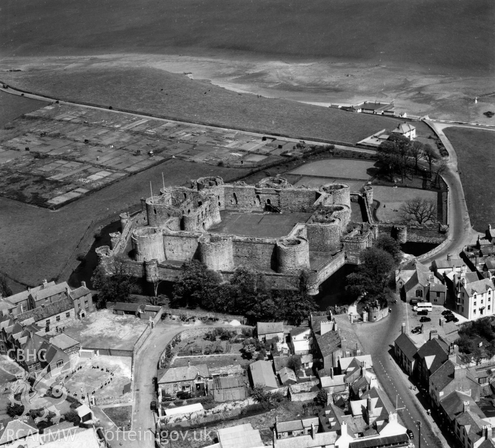 View of Beaumaris showing castle and grammar school. Oblique aerial photograph, 5?" cut roll film.
