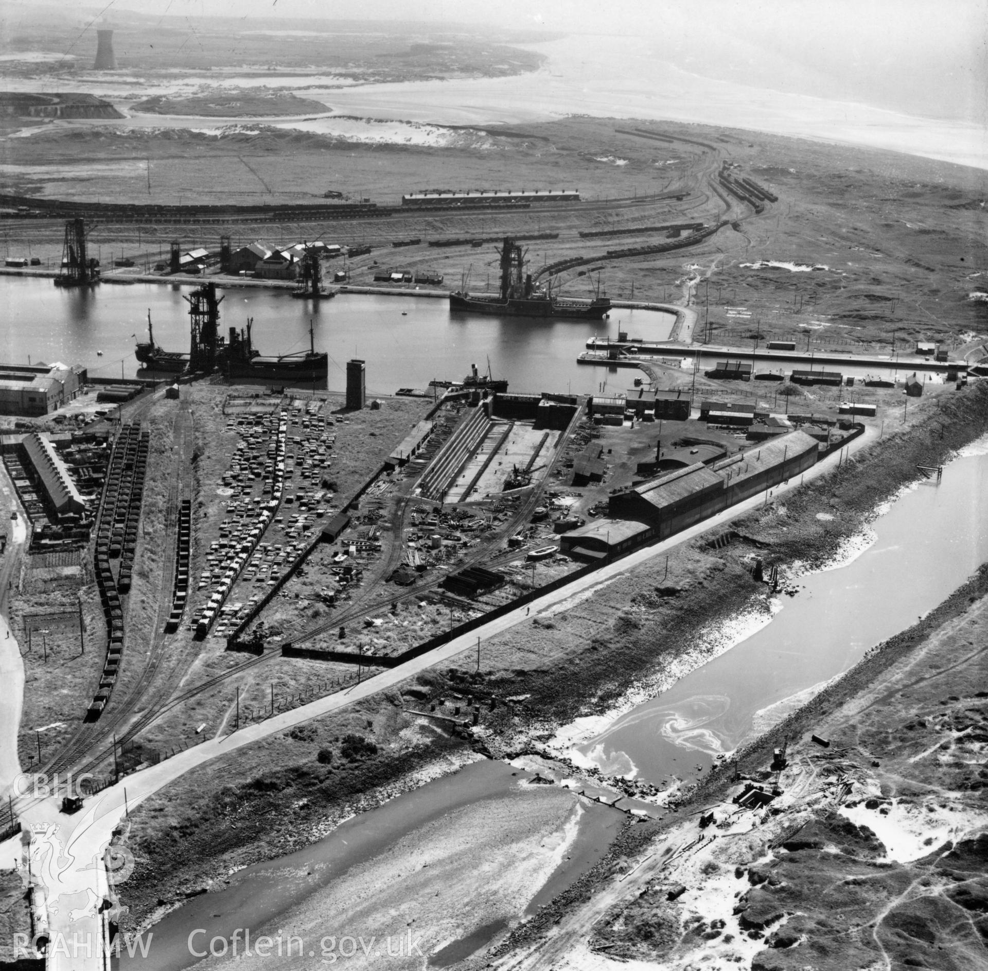View of dry, new and old docks and entrance channel, Port Talbot. Oblique aerial photograph, 5?" cut roll film.