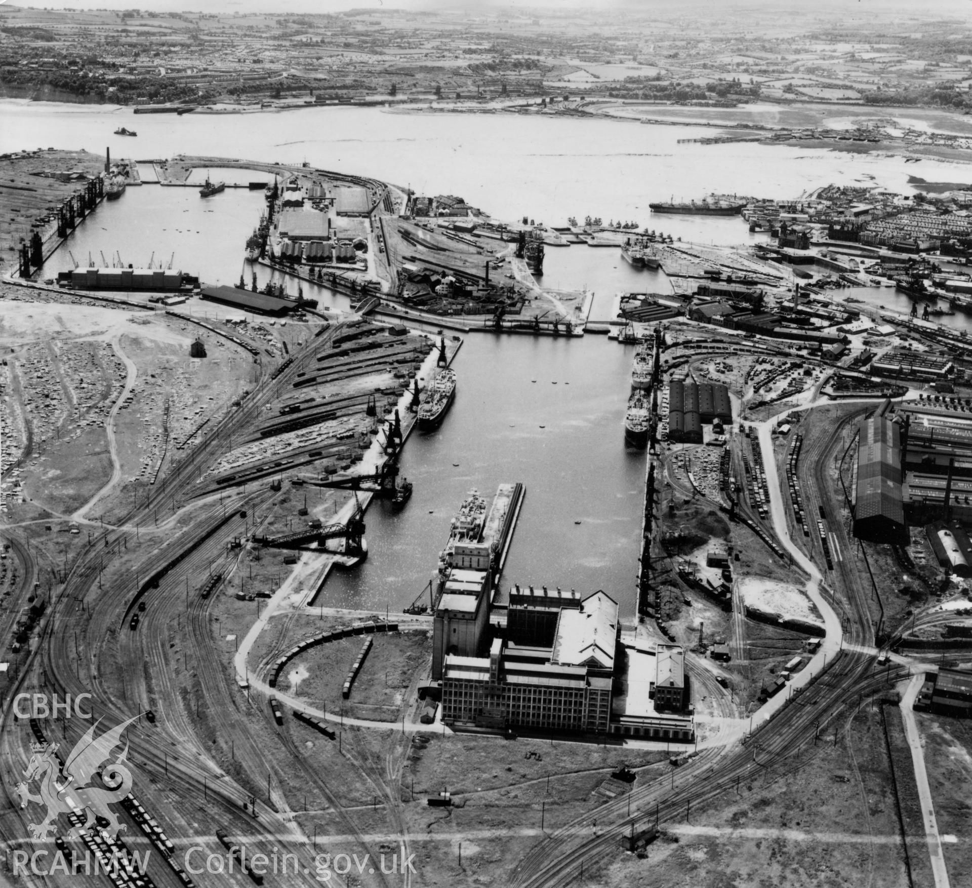 View of Cardiff docks from the east with Roath dock in the foreground. Oblique aerial photograph, 5?" cut roll film.