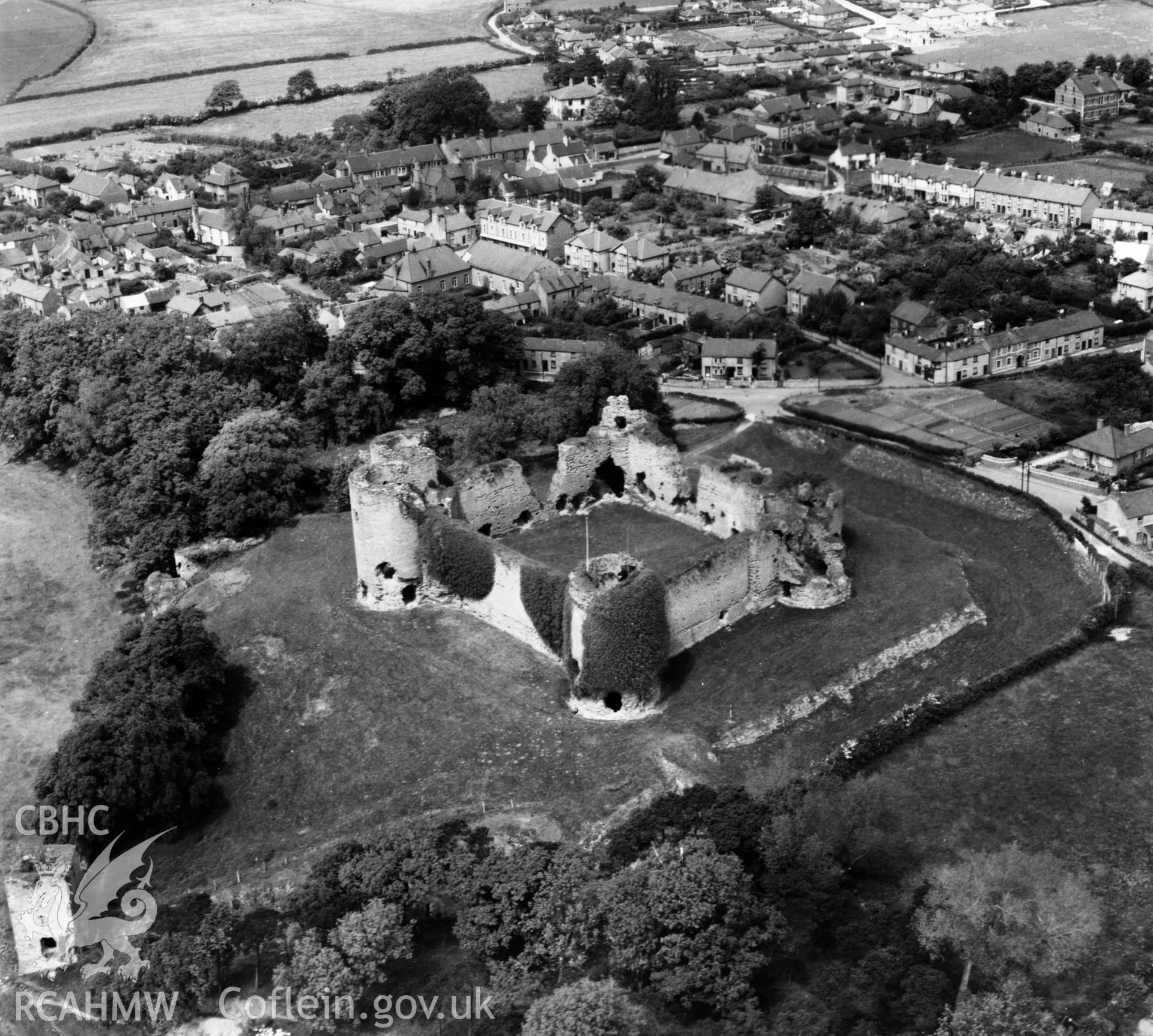 View of Rhuddlan showing castle. Oblique aerial photograph, 5?" cut roll film.