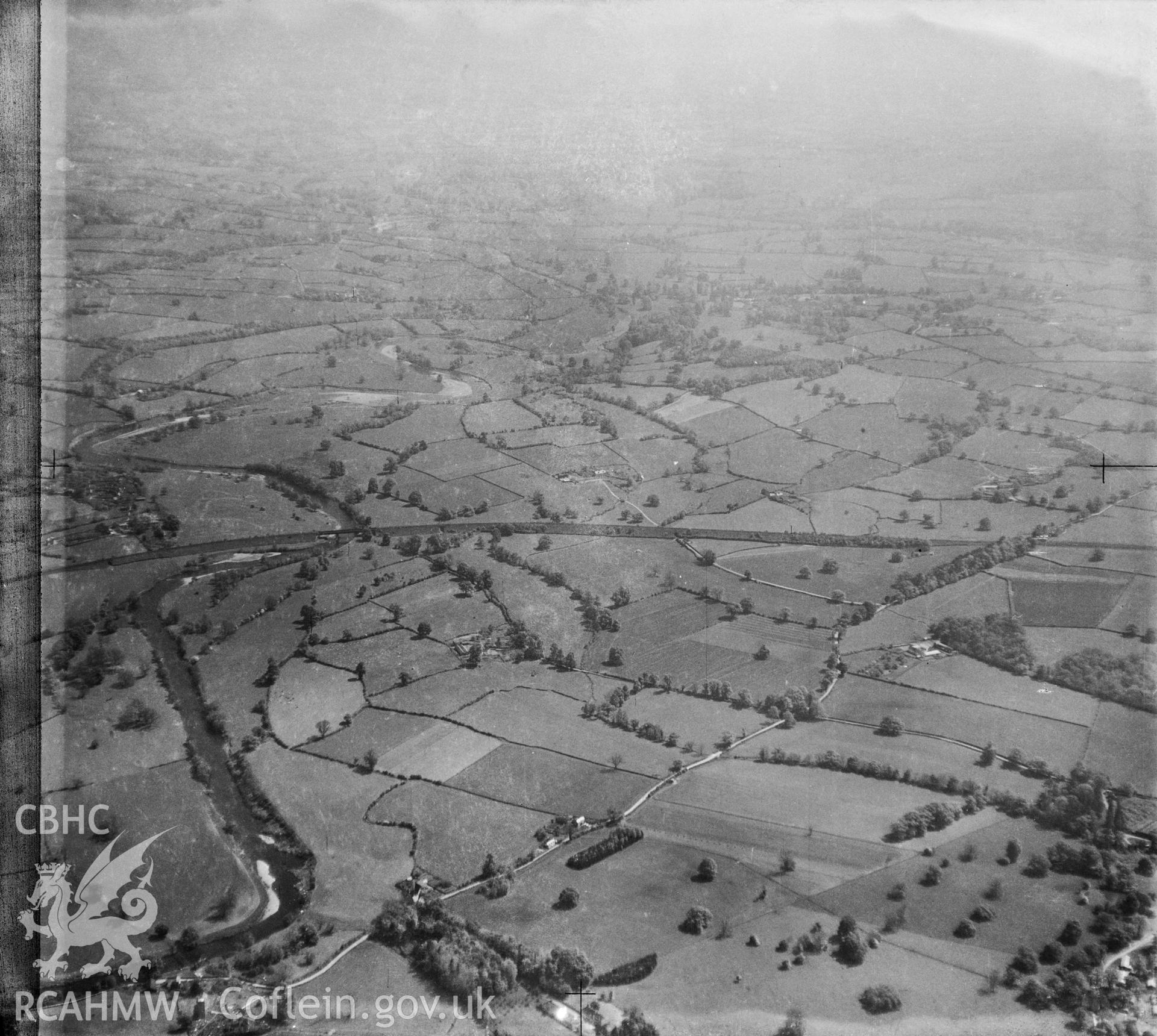 View of landscape south of Abergavenny showing the railway and river Usk
