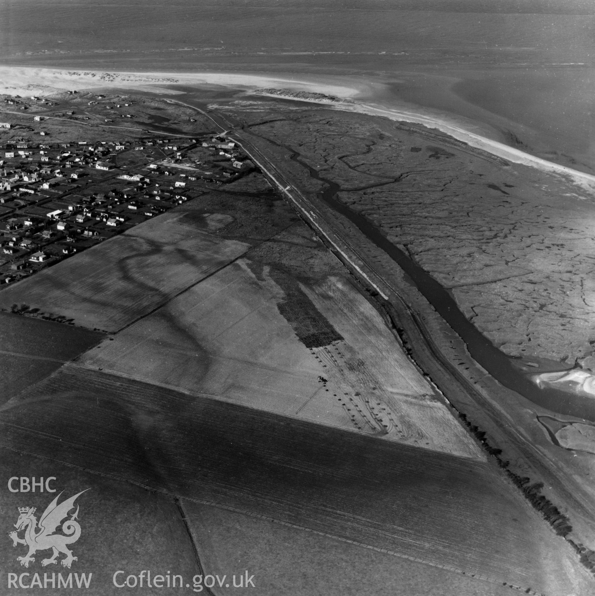 View of caravans and chalets on the Warren, Point of Ayr. Oblique aerial photograph, 5?" cut roll film.