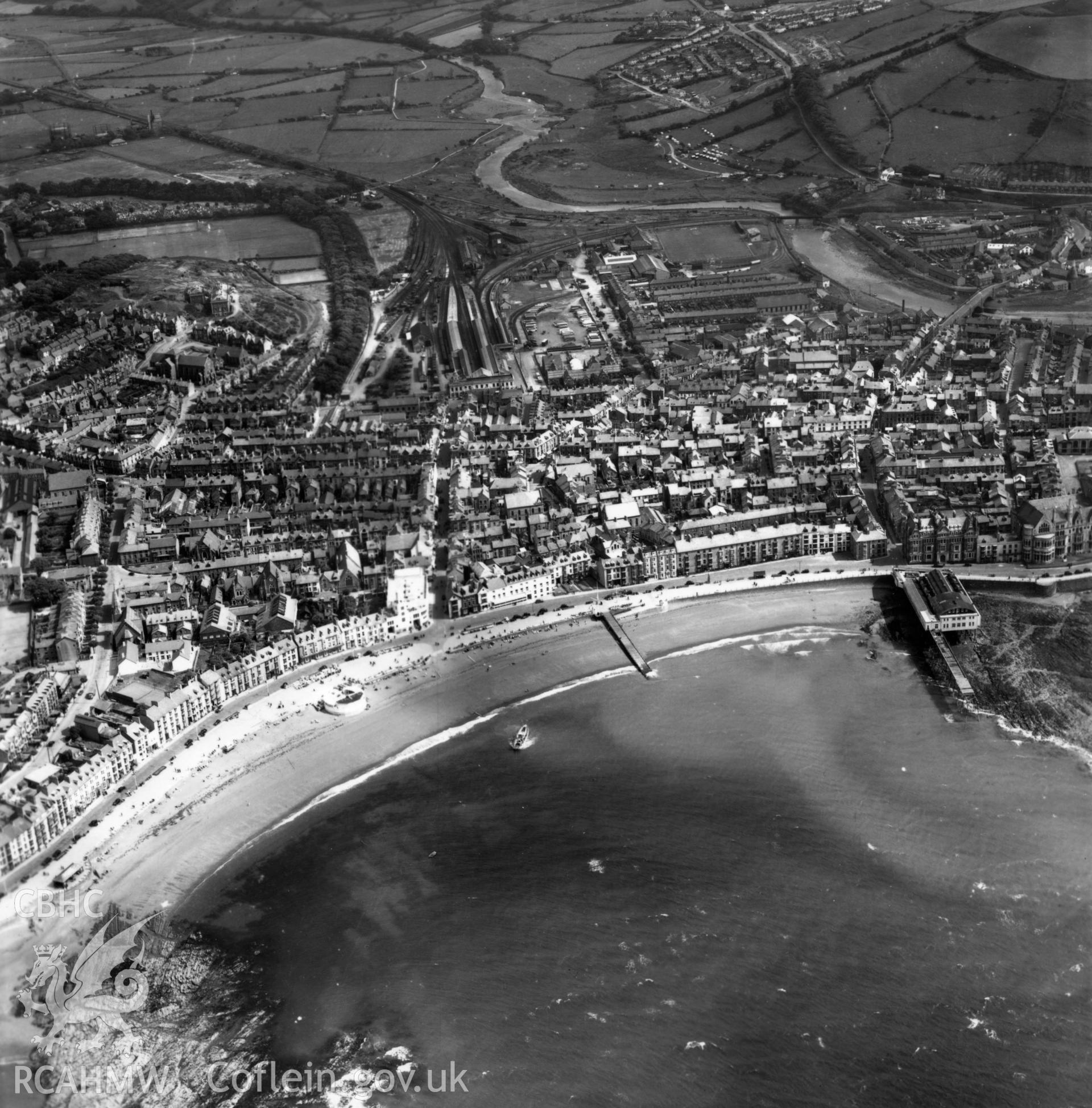 General view of Aberystwyth from the seafront looking south east. Oblique aerial photograph, 5?" cut roll film.