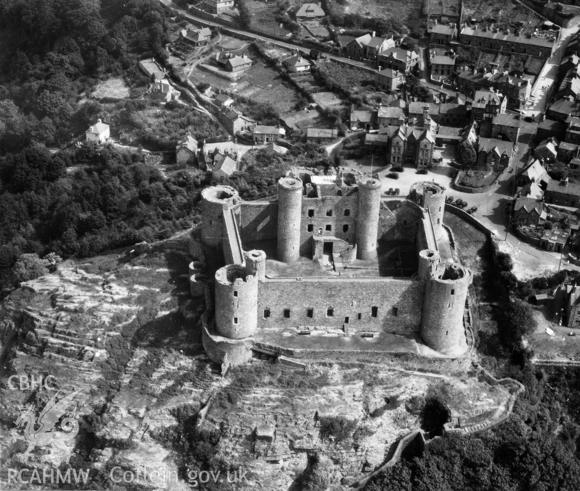 View of Harlech showing castle. Oblique aerial photograph, 5?" cut roll film.