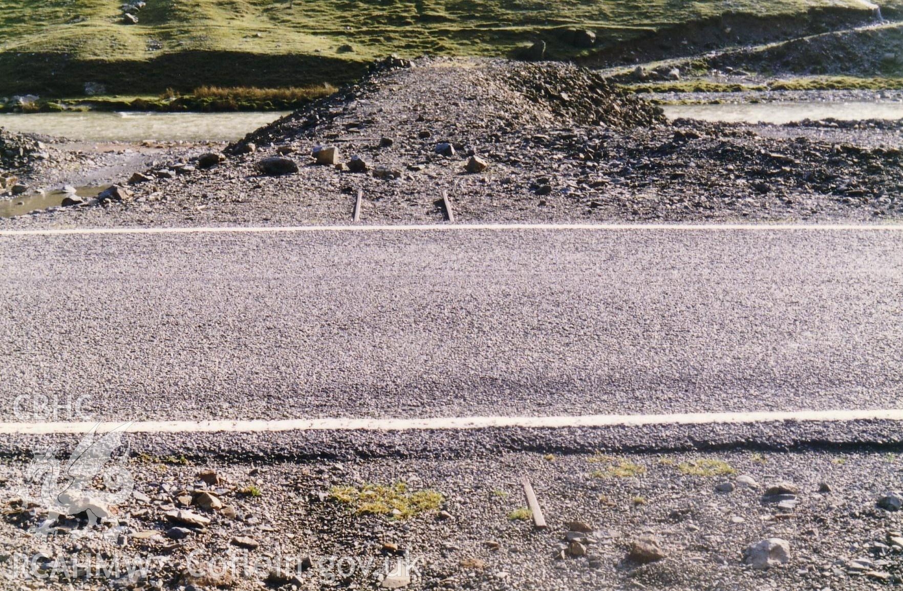 Tramway rails from Level y Ffordd buried under the road.