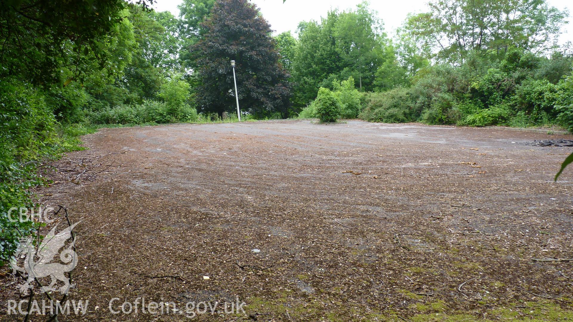 'View southeast across the car park at the northern end of the site.' Photographed as part of archaeological work at Coed Parc, Newcastle, Bridgend, carried out by Archaeology Wales, 2016. Project no. P2432.