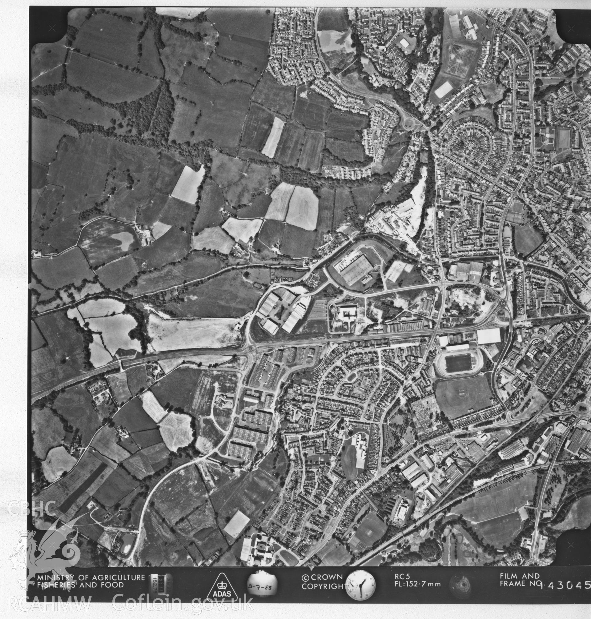 Aerial photograph of Cwmbran, taken in 1983. Included as part of Archaeology Wales' desk based assessment of former Llantarnam Community Primary School, Croeswen, Oakfield, Cwmbran, conducted in 2017.