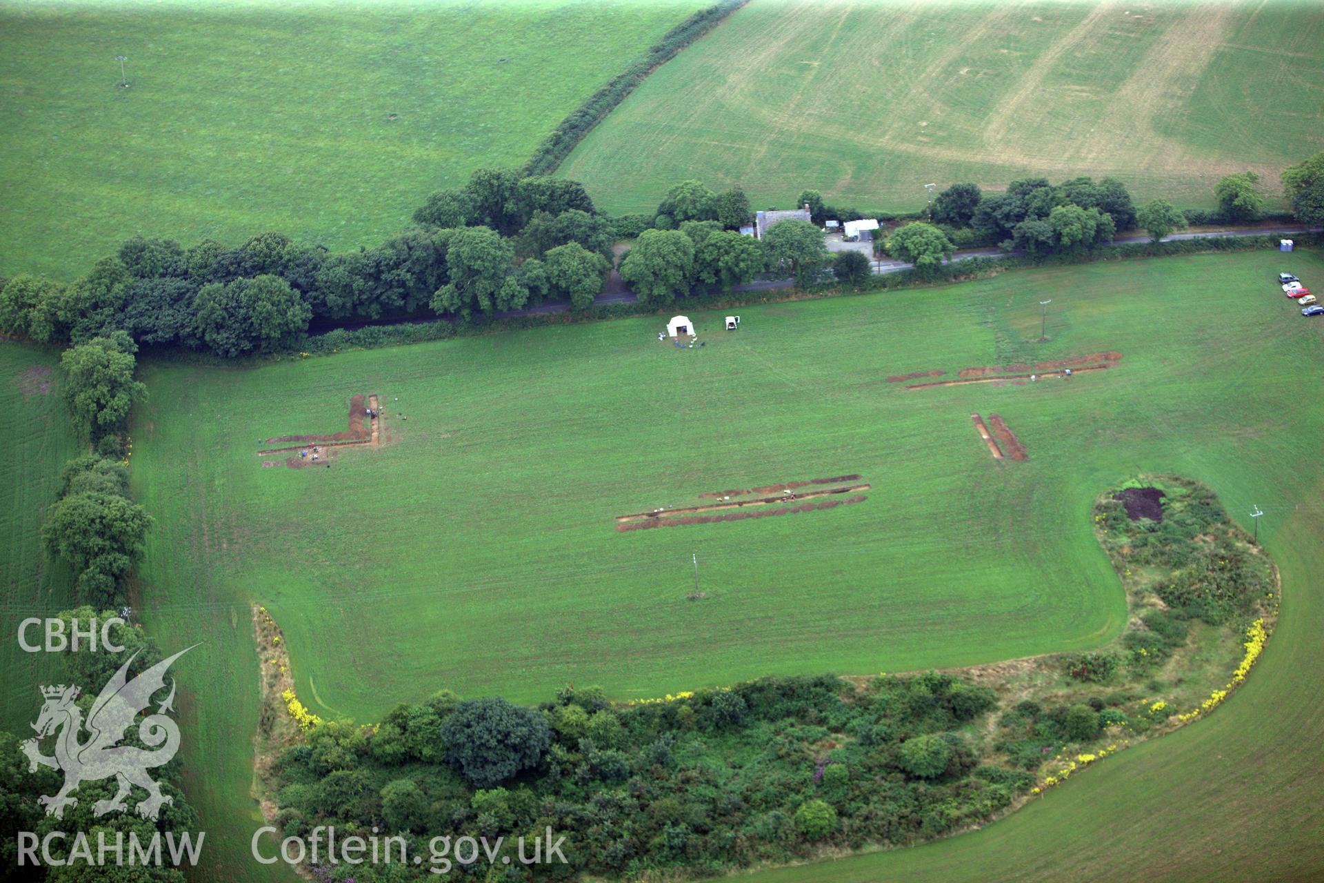 Wiston Roman Fort with excavations by Dyfed Archaeological Trust, north east of Haverfordwest. Oblique aerial photograph taken during the Royal Commission?s programme of archaeological aerial reconnaissance by Toby Driver on 1st August 2013.