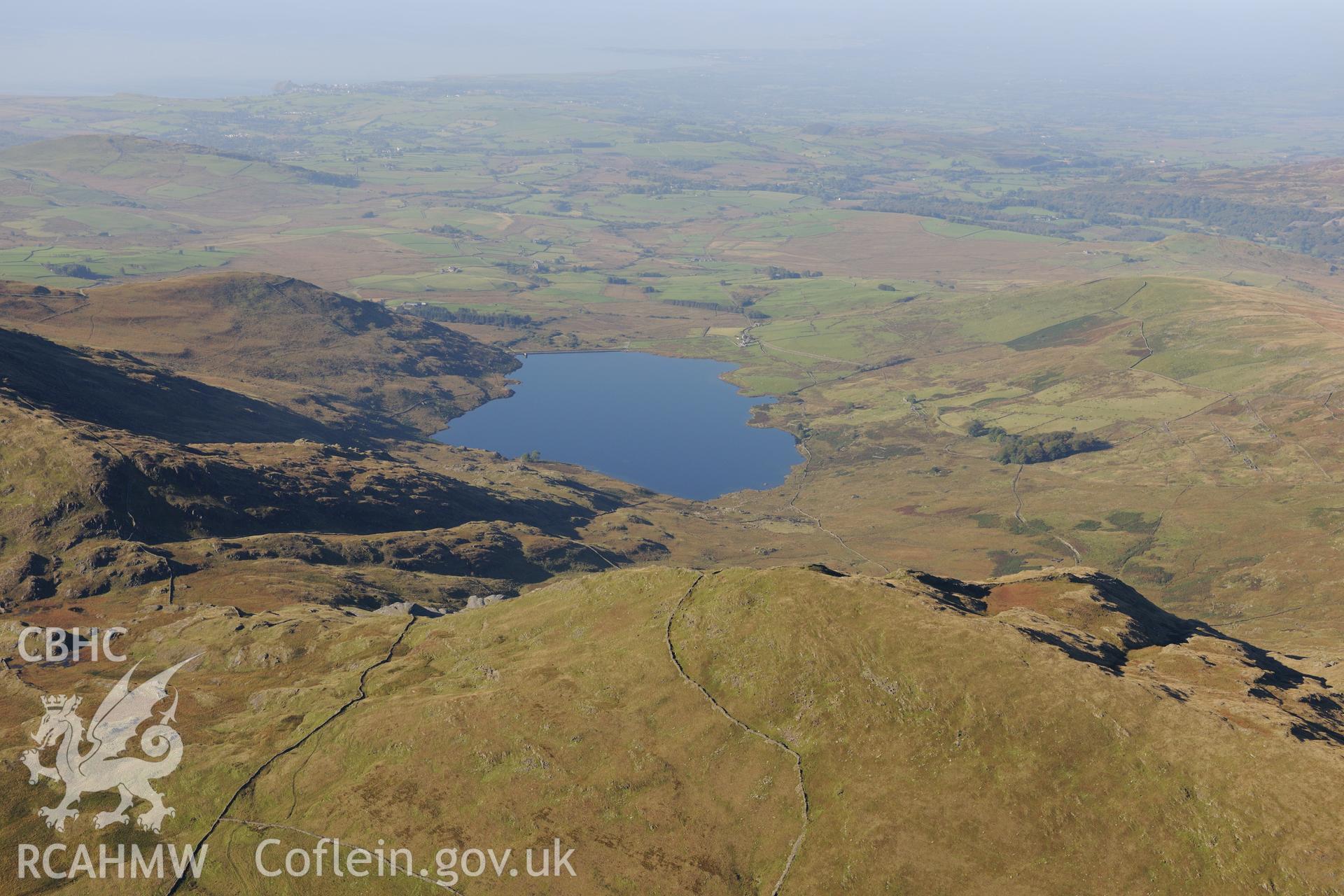 Llyn Cwmystradllyn reservoir, north of Porthmadog. Oblique aerial photograph taken during the Royal Commission's programme of archaeological aerial reconnaissance by Toby Driver on 2nd October 2015.