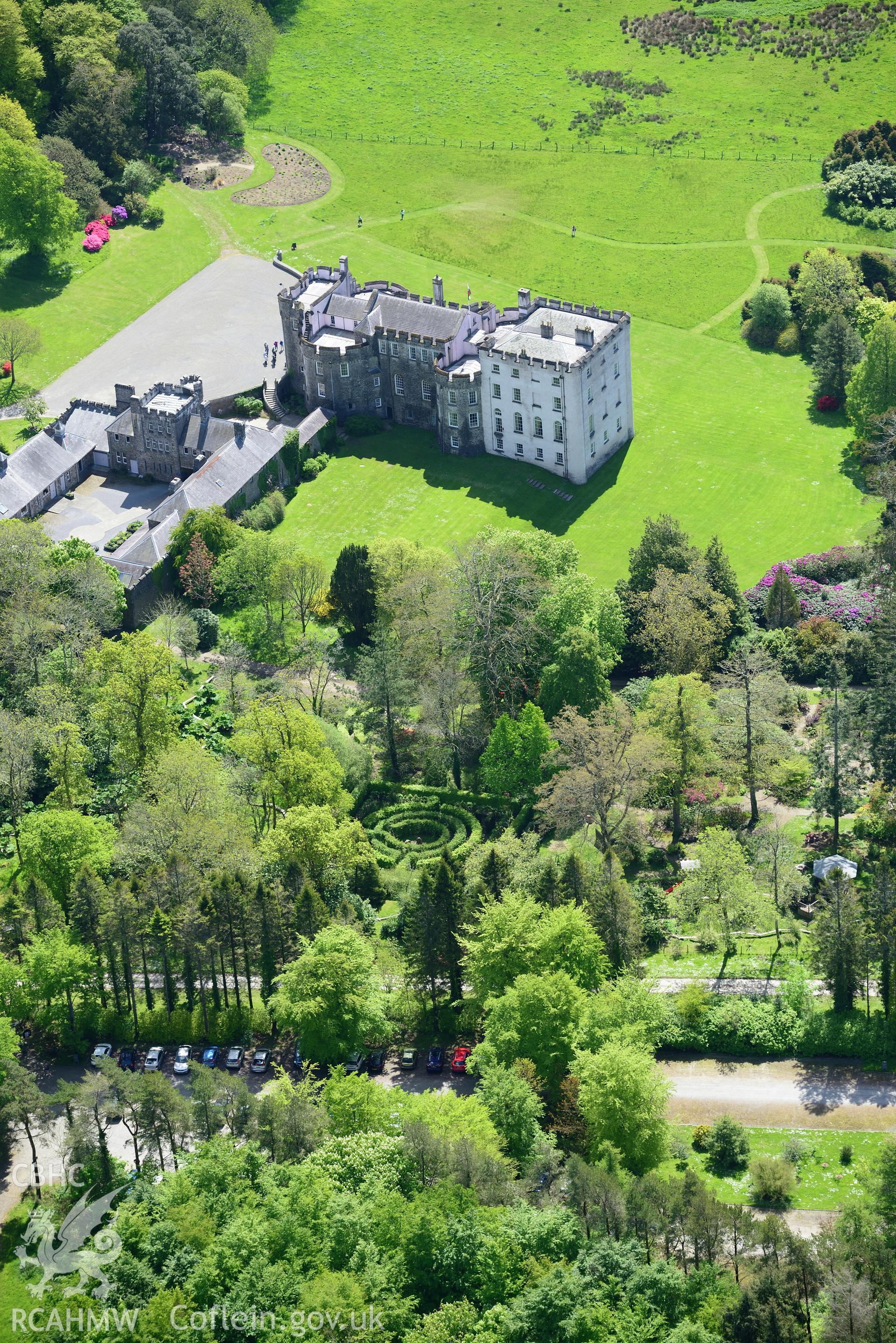 Picton Castle and gardens, Slebech. Oblique aerial photograph taken during the Royal Commission's programme of archaeological aerial reconnaissance by Toby Driver on 13th May 2015.