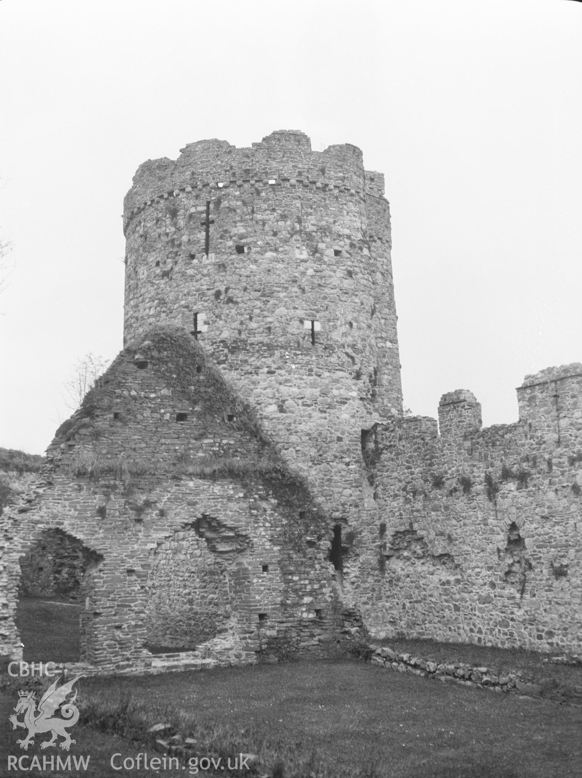 Digital copy of a nitrate negative showing exterior view of north-east drum tower, Kidwelly Castle. From the National Building Record Postcard Collection.