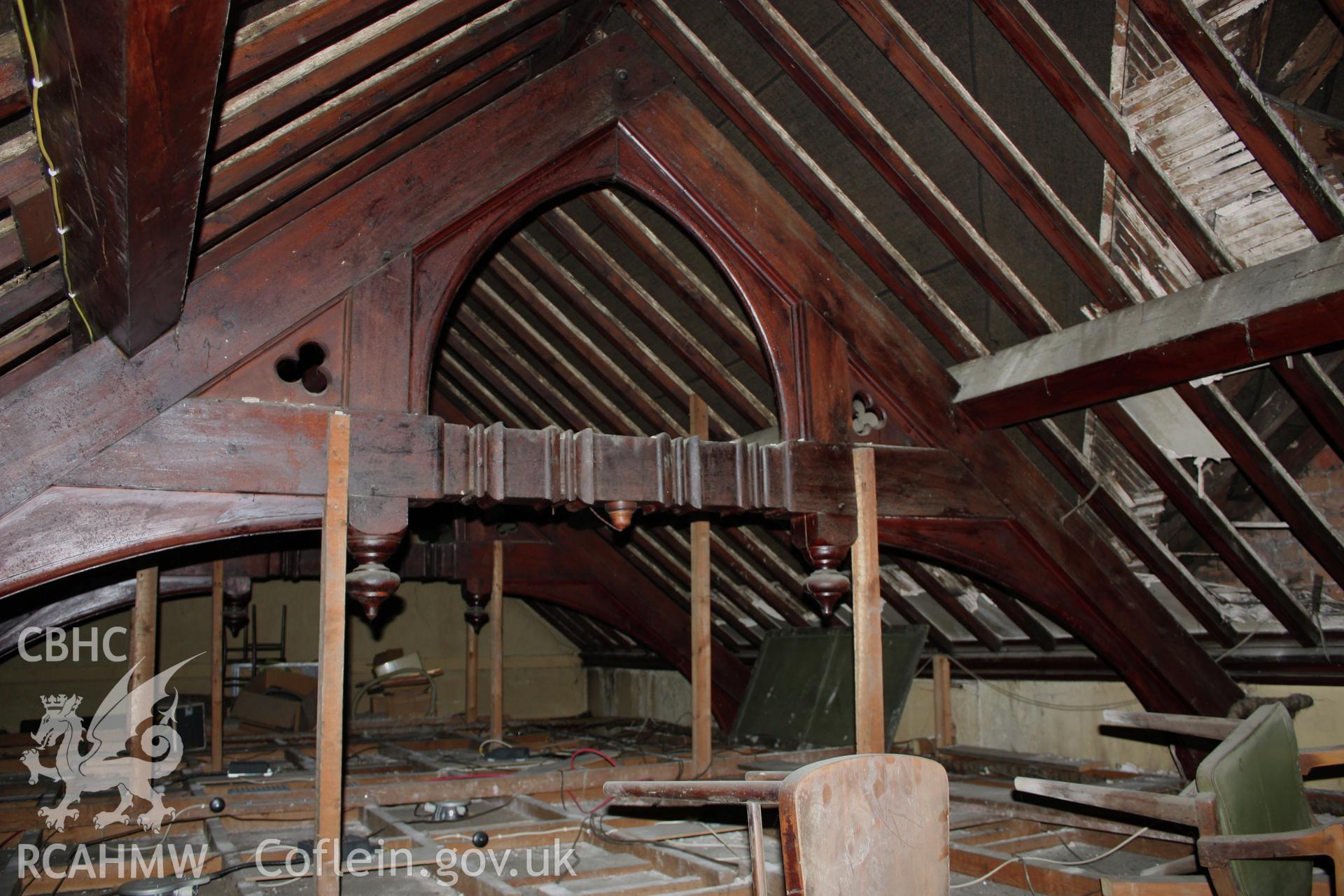 Colour photograph of two trusses over the central first floor meeting room at the Conservative Club on Portland Place in Denbigh. Photographic survey conducted by Sue Fielding on 31st August 2011.