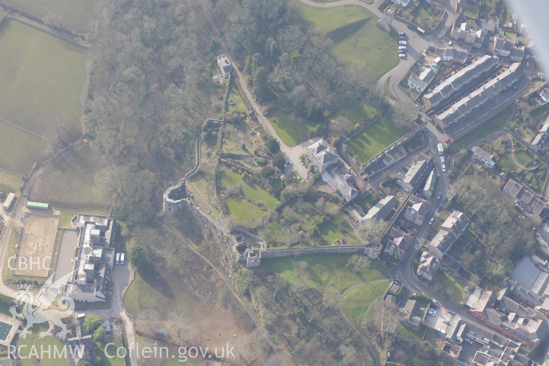 St. David's or Leicester's church, the upper town's walls and Castle House, Denbigh. Oblique aerial photograph taken during the Royal Commission?s programme of archaeological aerial reconnaissance by Toby Driver on 28th February 2013.