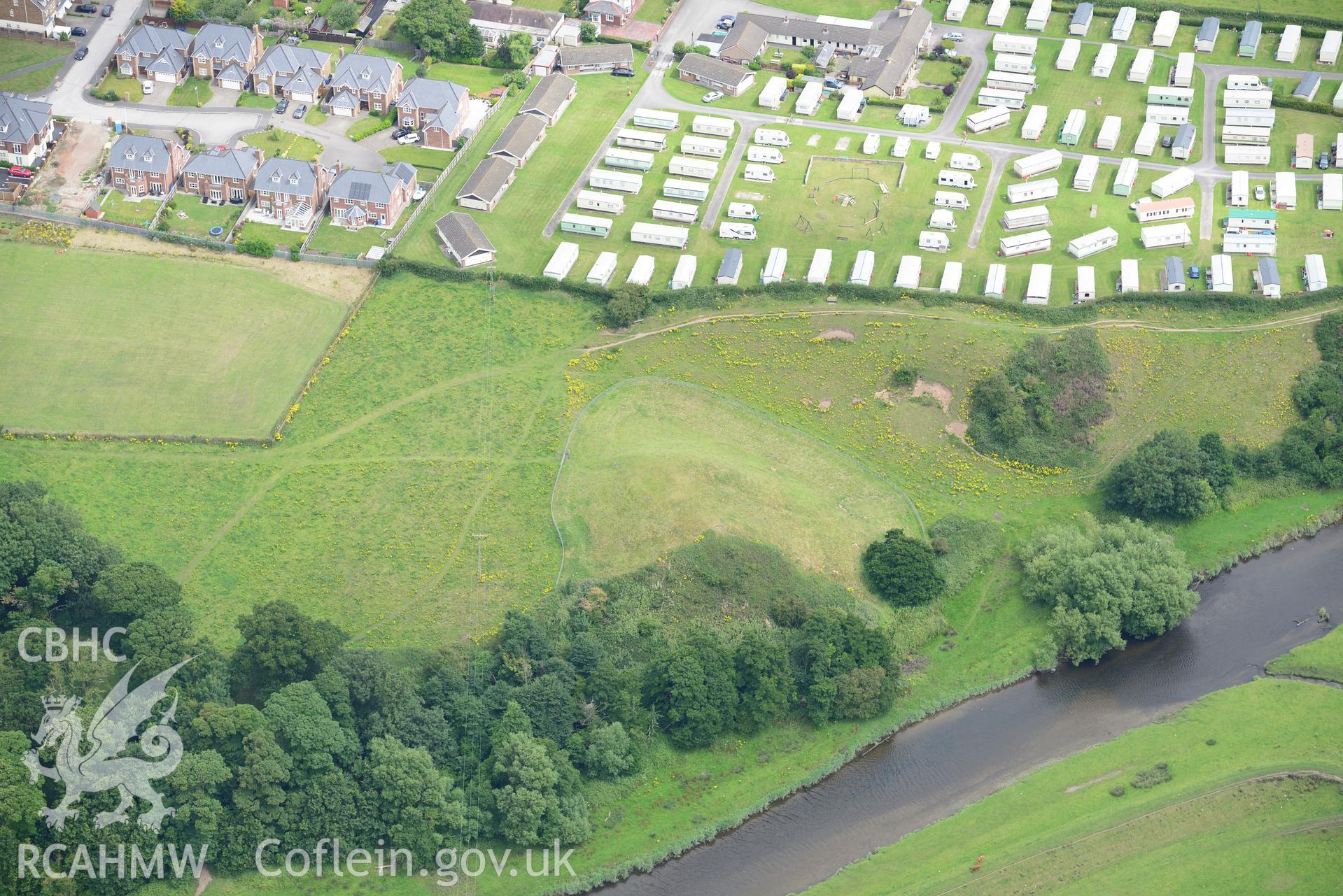 Twt Hill motte and bailey, and Norman borough, Rhuddlan. Oblique aerial photograph taken during the Royal Commission's programme of archaeological aerial reconnaissance by Toby Driver on 30th July 2015.