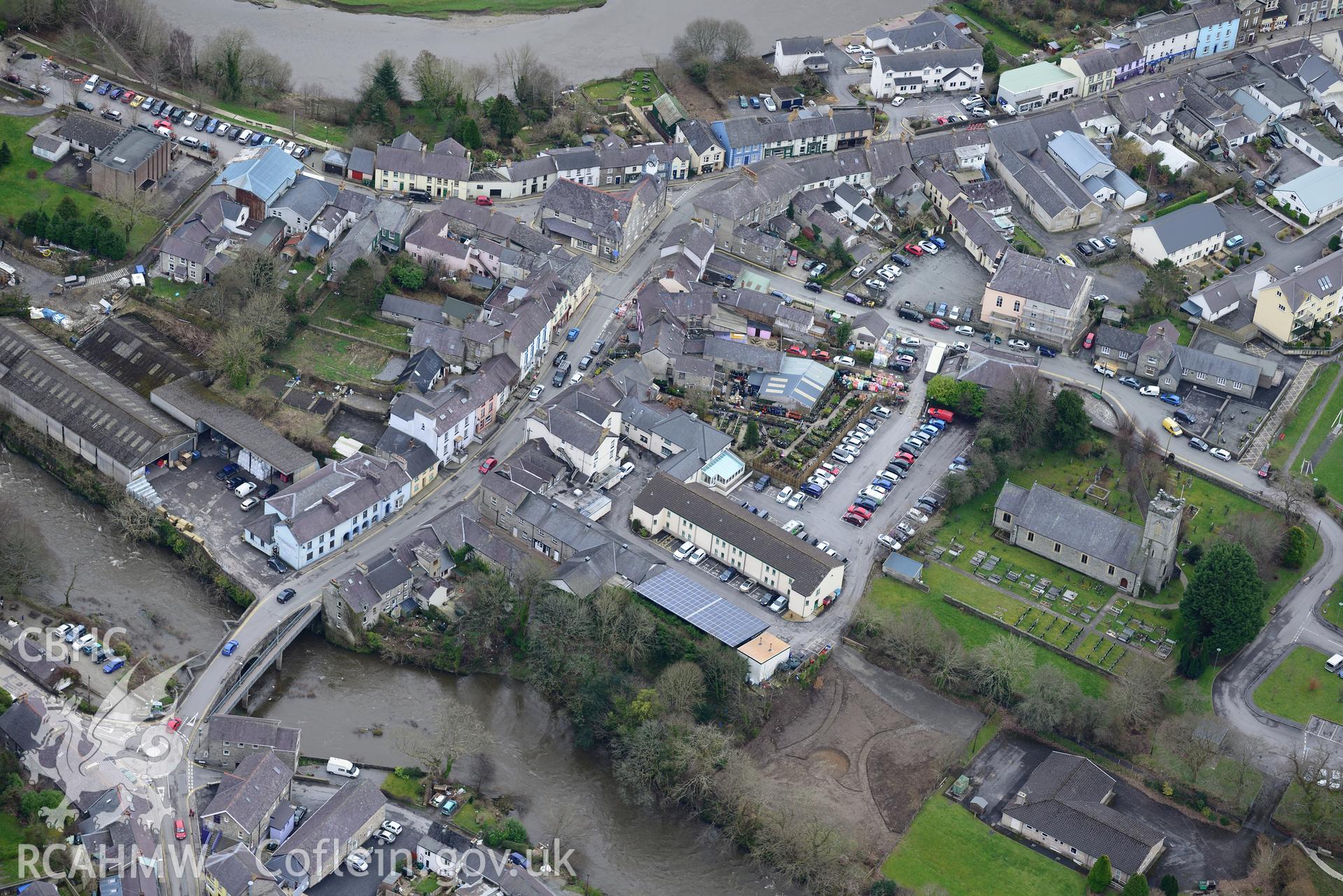 Holy Trinity Church and Newcastle Emlyn Bridge, Newcastle Emlyn. Oblique aerial photograph taken during the Royal Commission's programme of archaeological aerial reconnaissance by Toby Driver on 13th March 2015.