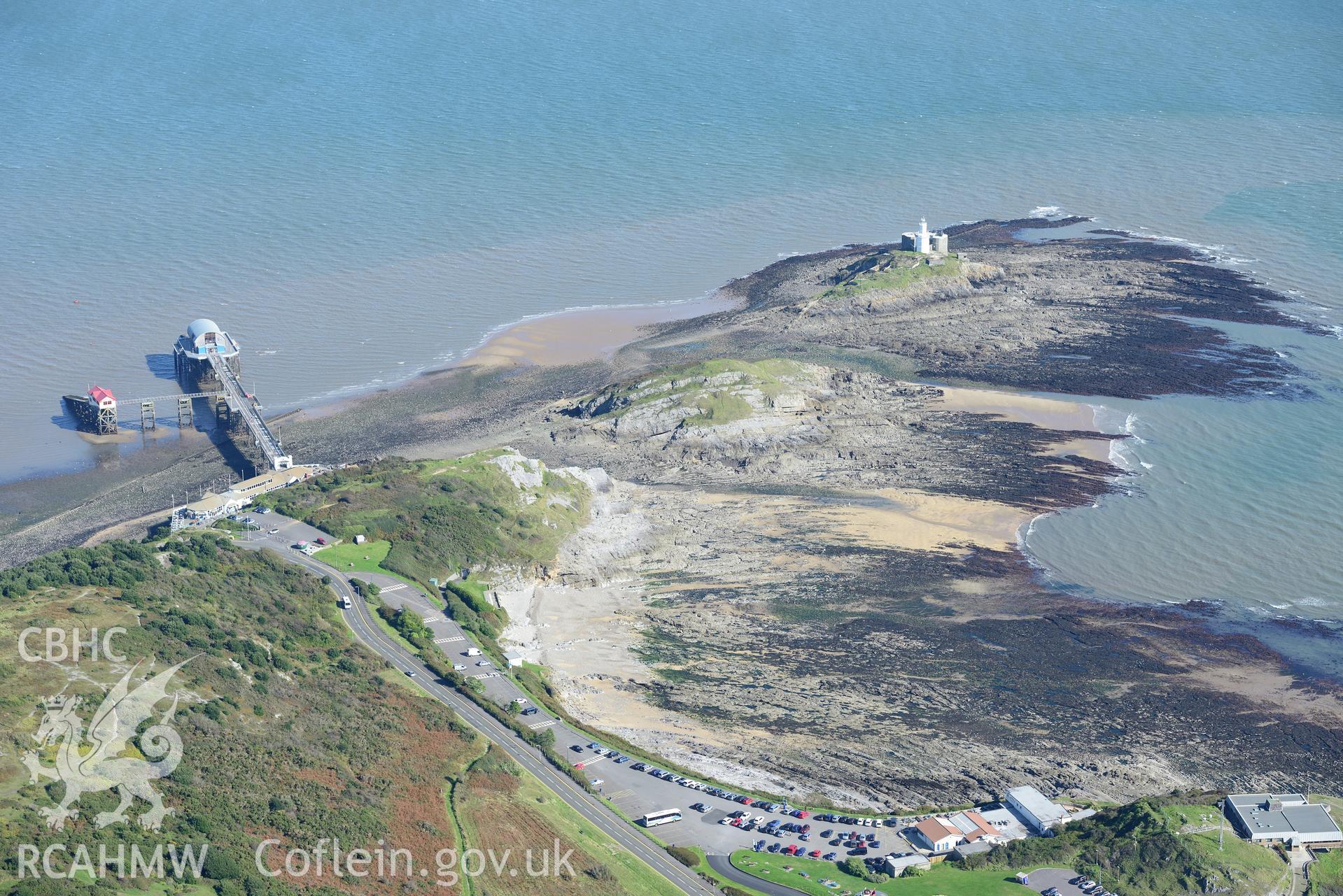 Mumbles fort, pier, coastguard station and lighthouse at the south western edge of Swansea Bay. Oblique aerial photograph taken during the Royal Commission's programme of archaeological aerial reconnaissance by Toby Driver on 30th September 2015.