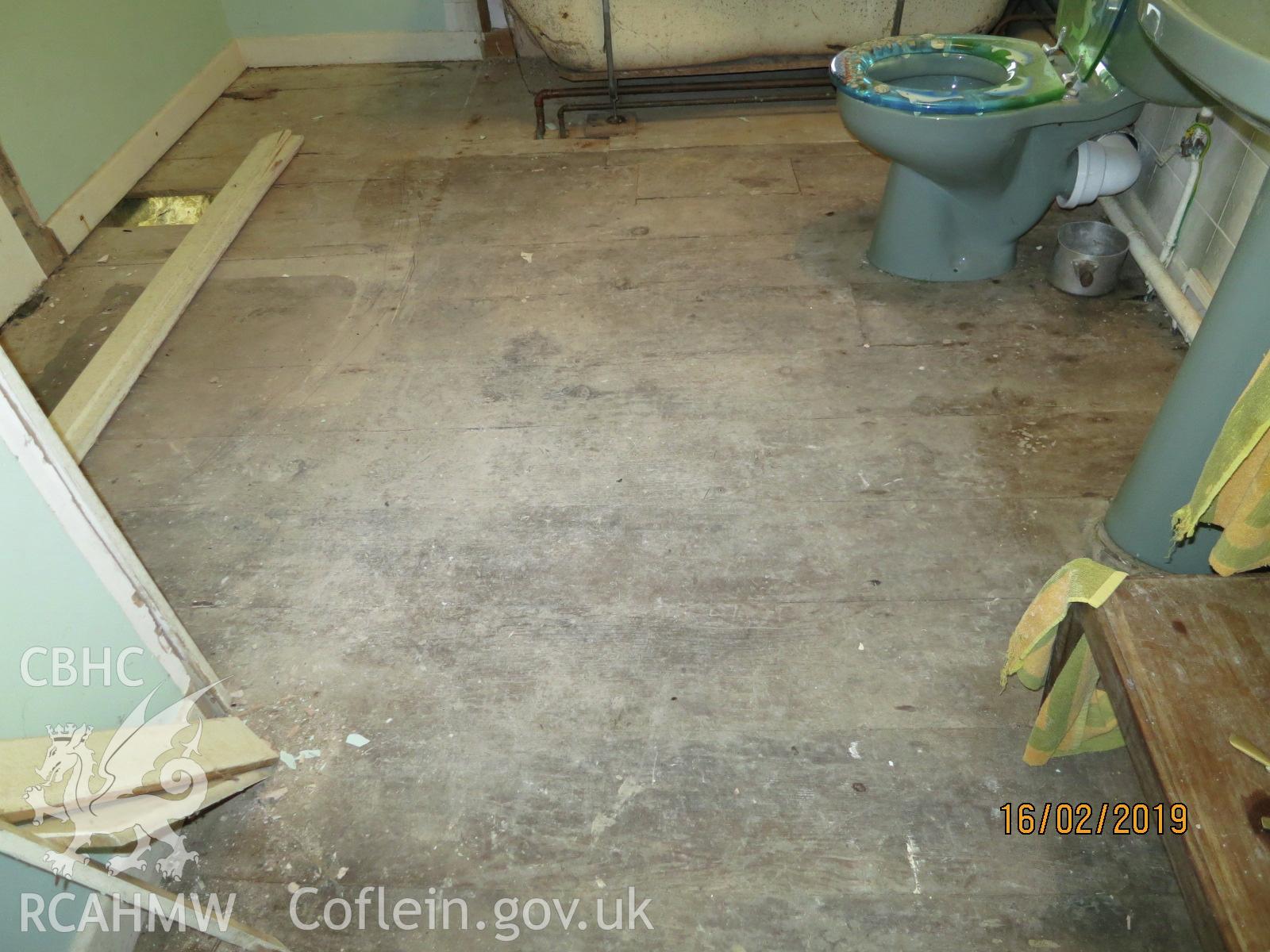 Interior bathroom floor in the house at Pencerrig Pellaf, Ffordd Uchaf, Harlech. Photographed by Kimberley Urch as part of photographic survey for planning application (ref. no. NP5/61/LB446A Snowdonia National Park Authority).