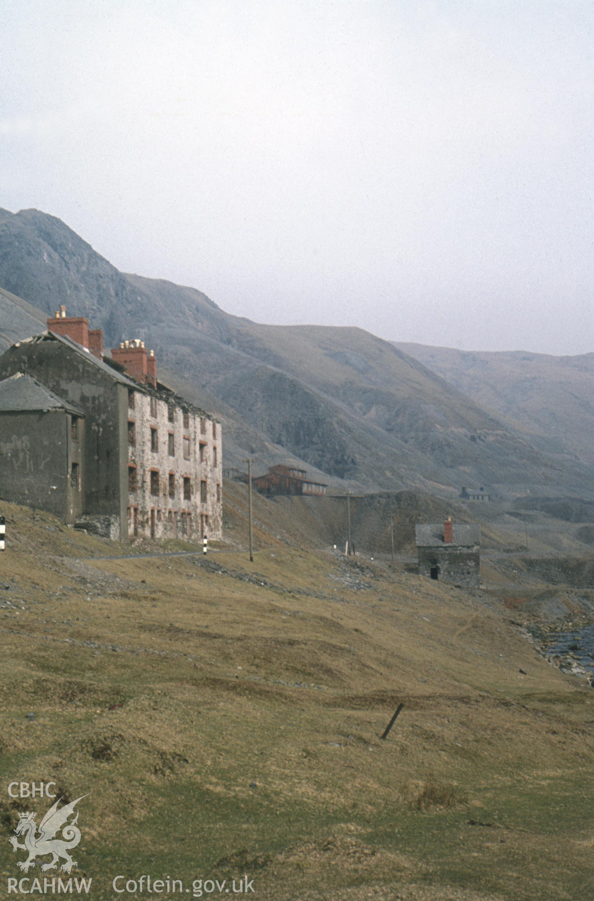 Digital copy of a colour slide produced by Stephen Hughes and dated 1974, showing a view of Barracks at Cwmystwyth Lead Mine Complex.