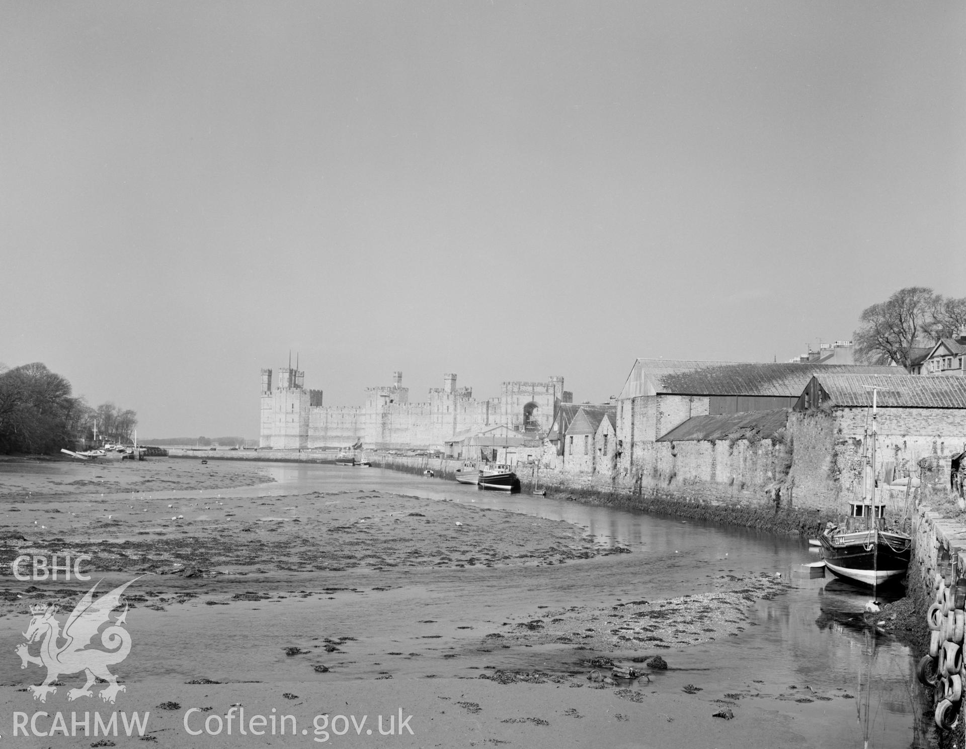 Digital copy of a black and white negative showing Caernarfon Castle, collated by the former Central Office of Information.