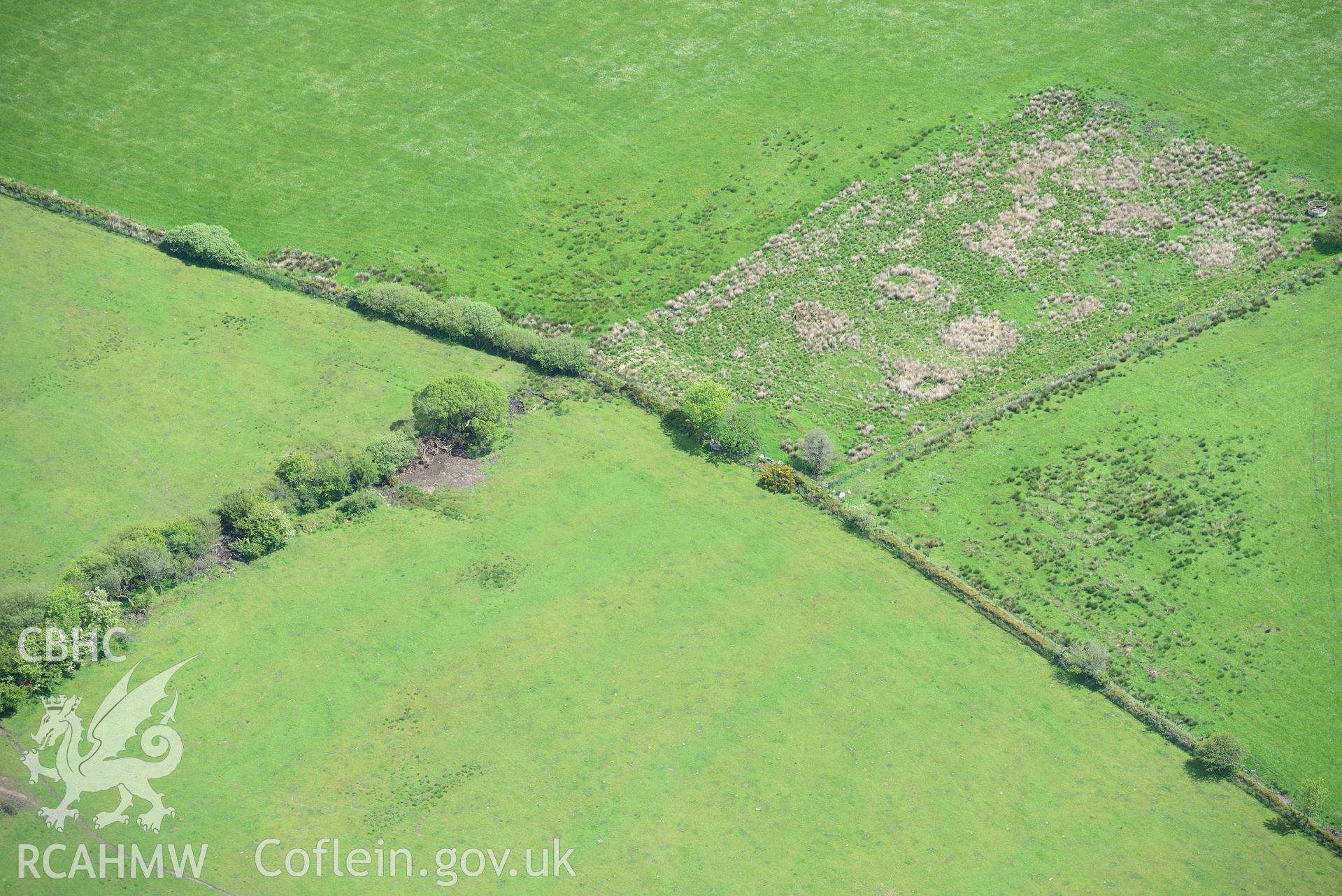 Cerrig Llwydion Chambered Tomb. Oblique aerial photograph taken during the Royal Commission's programme of archaeological aerial reconnaissance by Toby Driver on 3rd June 2015.