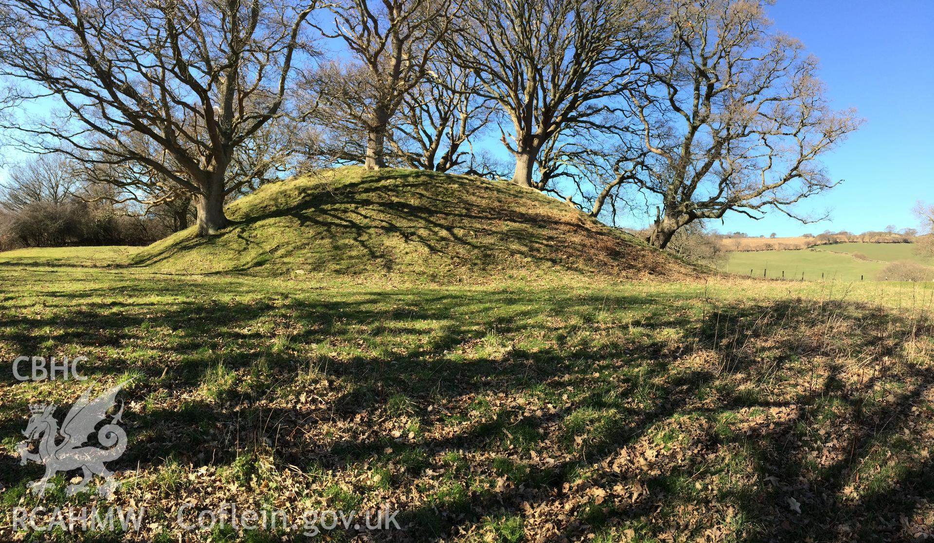 Colour photo showing view of Tal-y-cafn motte, taken by Paul R. Davis, 28th February 2018.