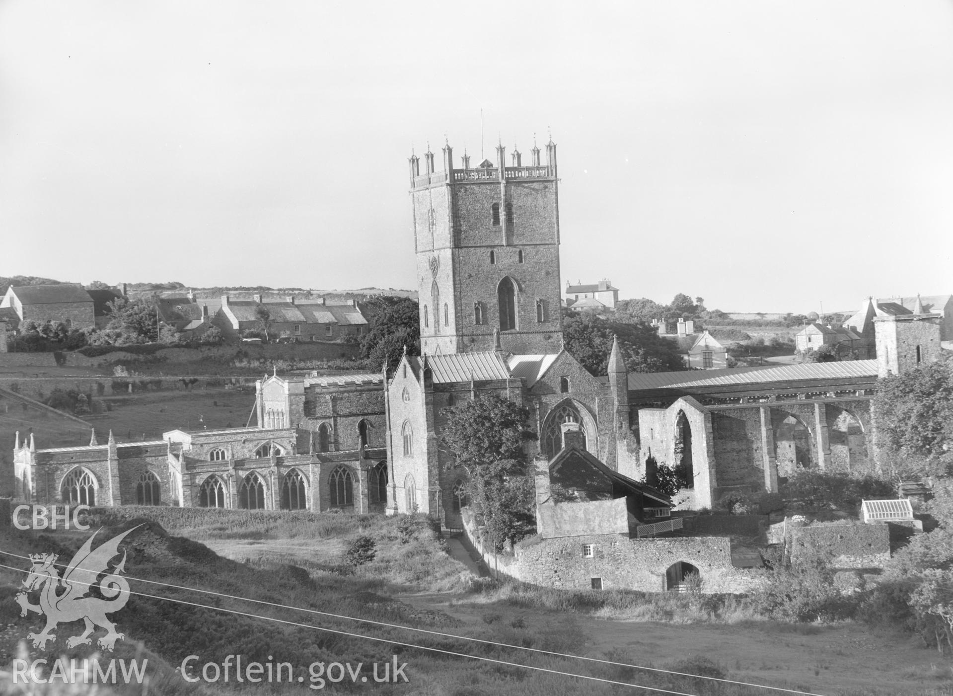 Digital copy of a black and white nitrate negative showing general view of St. David's Cathedral, taken by E.W. Lovegrove, July 1936.