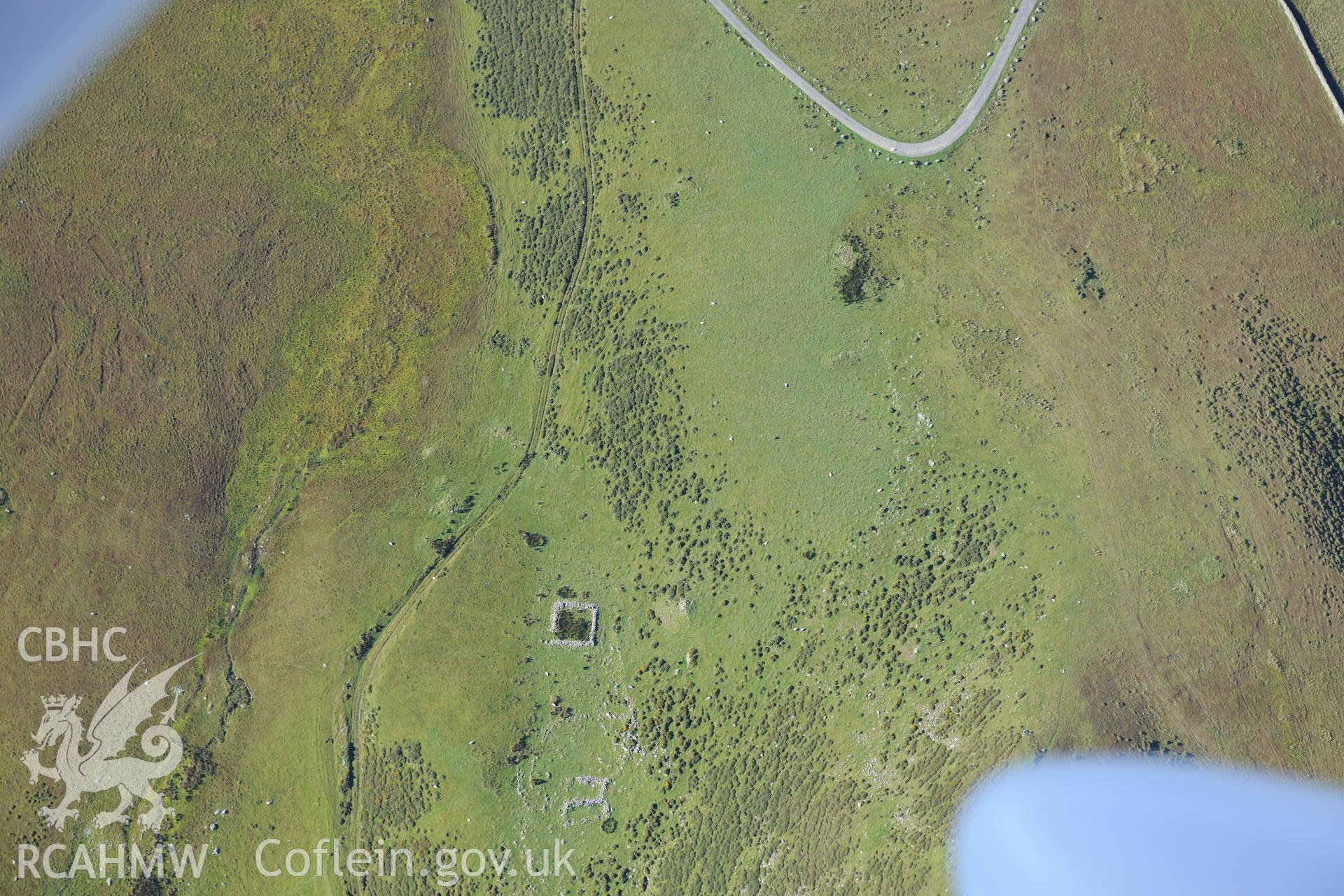 Ruined building and sheepfold east of Hafoty Fach near Llynnau Cregennen, Cadair Idris. Oblique aerial photograph taken during the Royal Commission's programme of archaeological aerial reconnaissance by Toby Driver on 2nd October 2015.