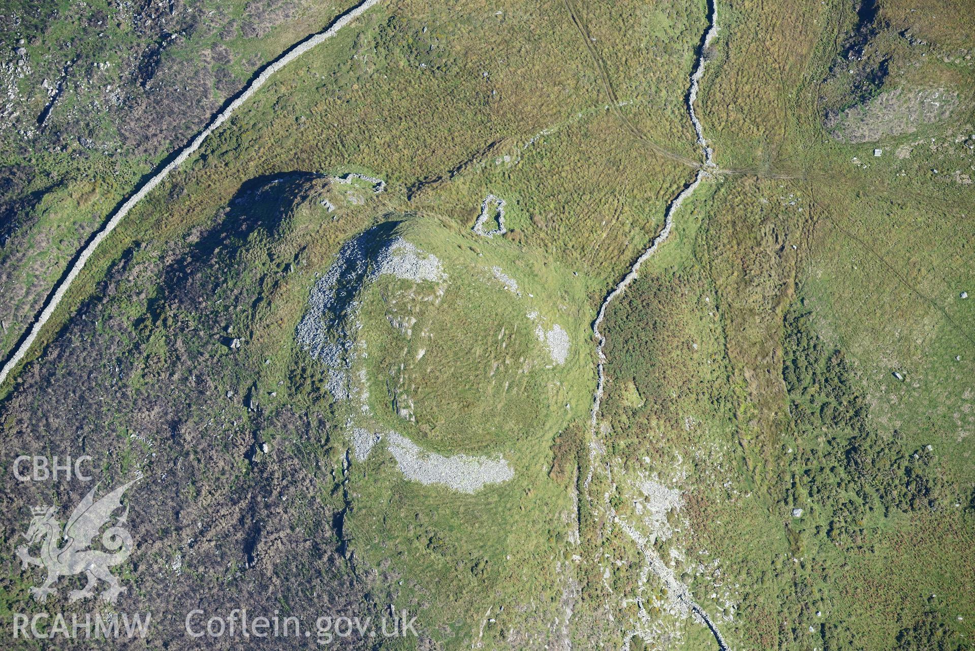 Bryn Castell hillfort, north east of Barmouth. Oblique aerial photograph taken during the Royal Commission's programme of archaeological aerial reconnaissance by Toby Driver on 2nd October 2015.