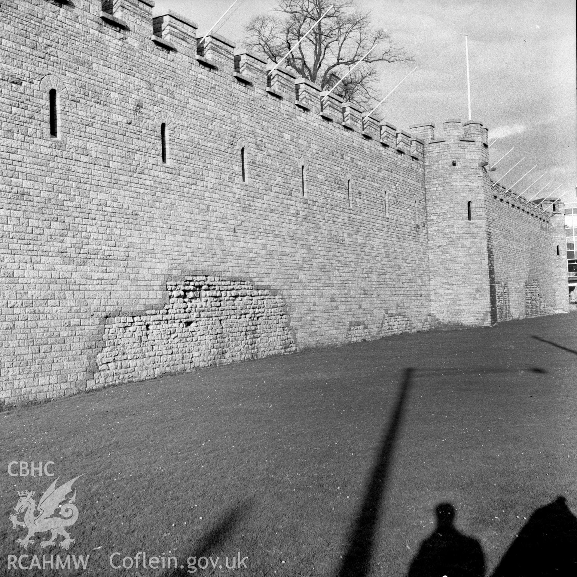 Digital copy of a black and white negative showing west wall of Cardiff Castle, dated 21st February 1966.