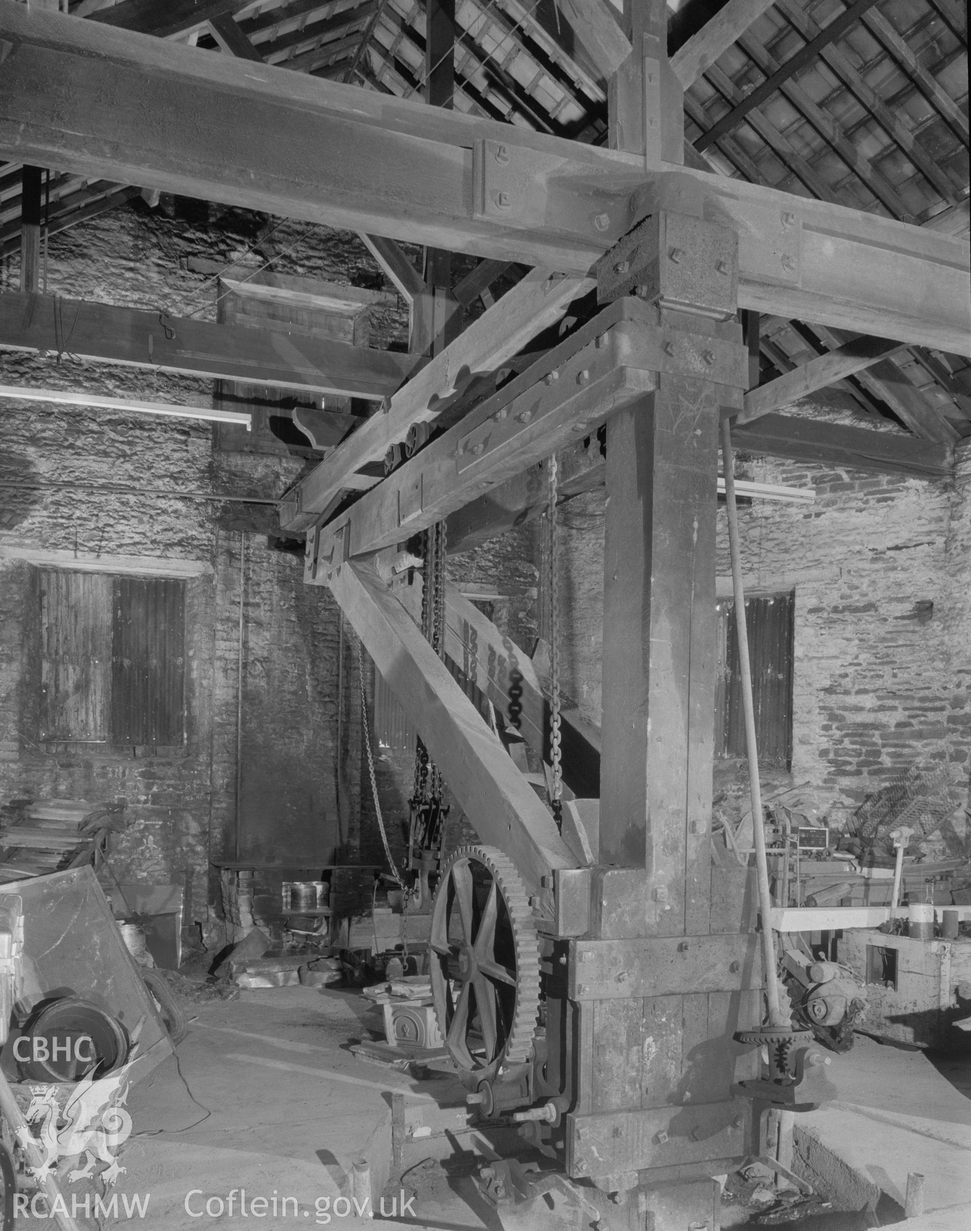 Digital copy of a black and white negative showing detail of the crane at Player's Works Foundry, Clydach, taken by RCAHMW, undated.