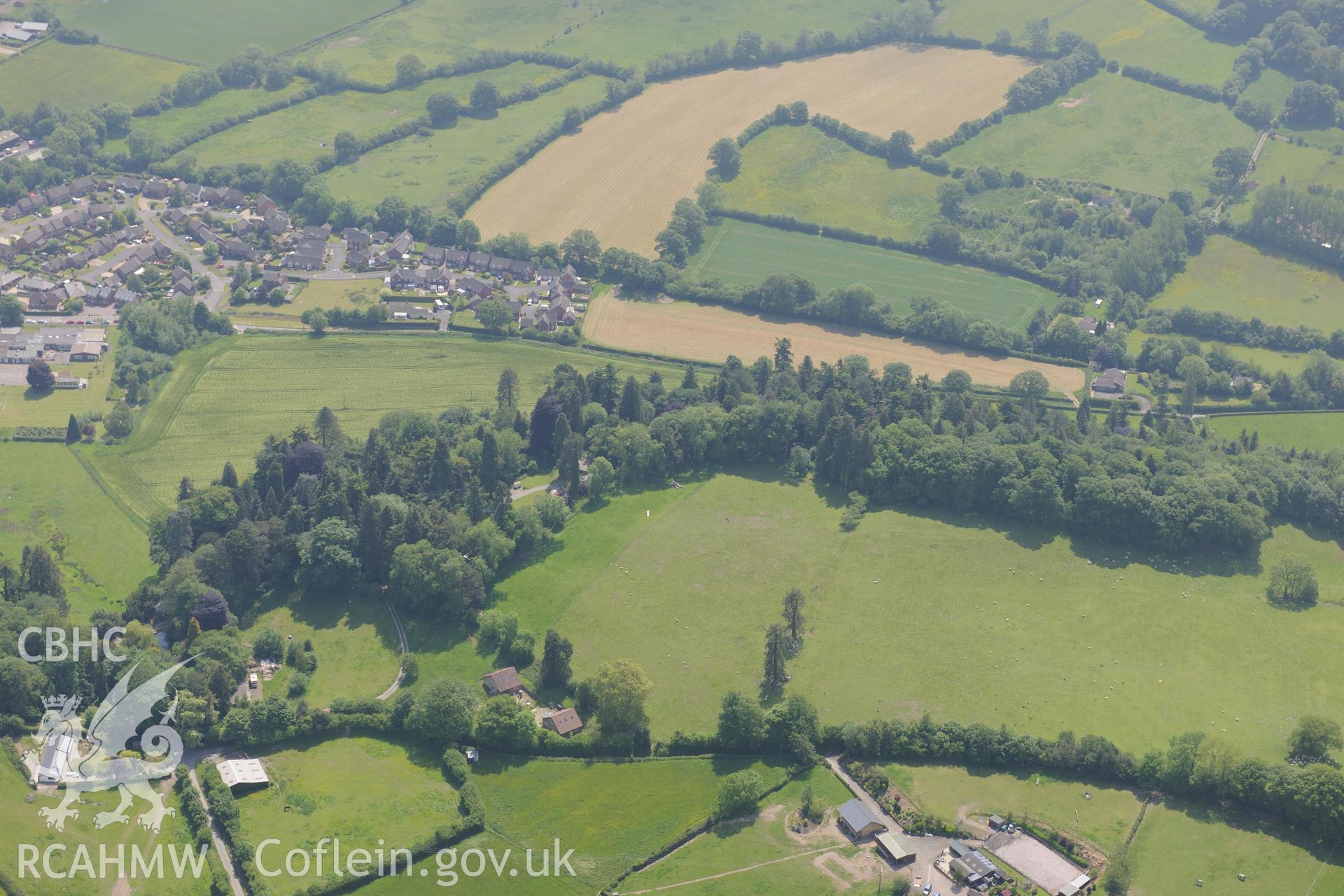 Outskirts of Prestigne town. Oblique aerial photograph taken during the Royal Commission's programme of archaeological aerial reconnaissance by Toby Driver on 11th June 2015.