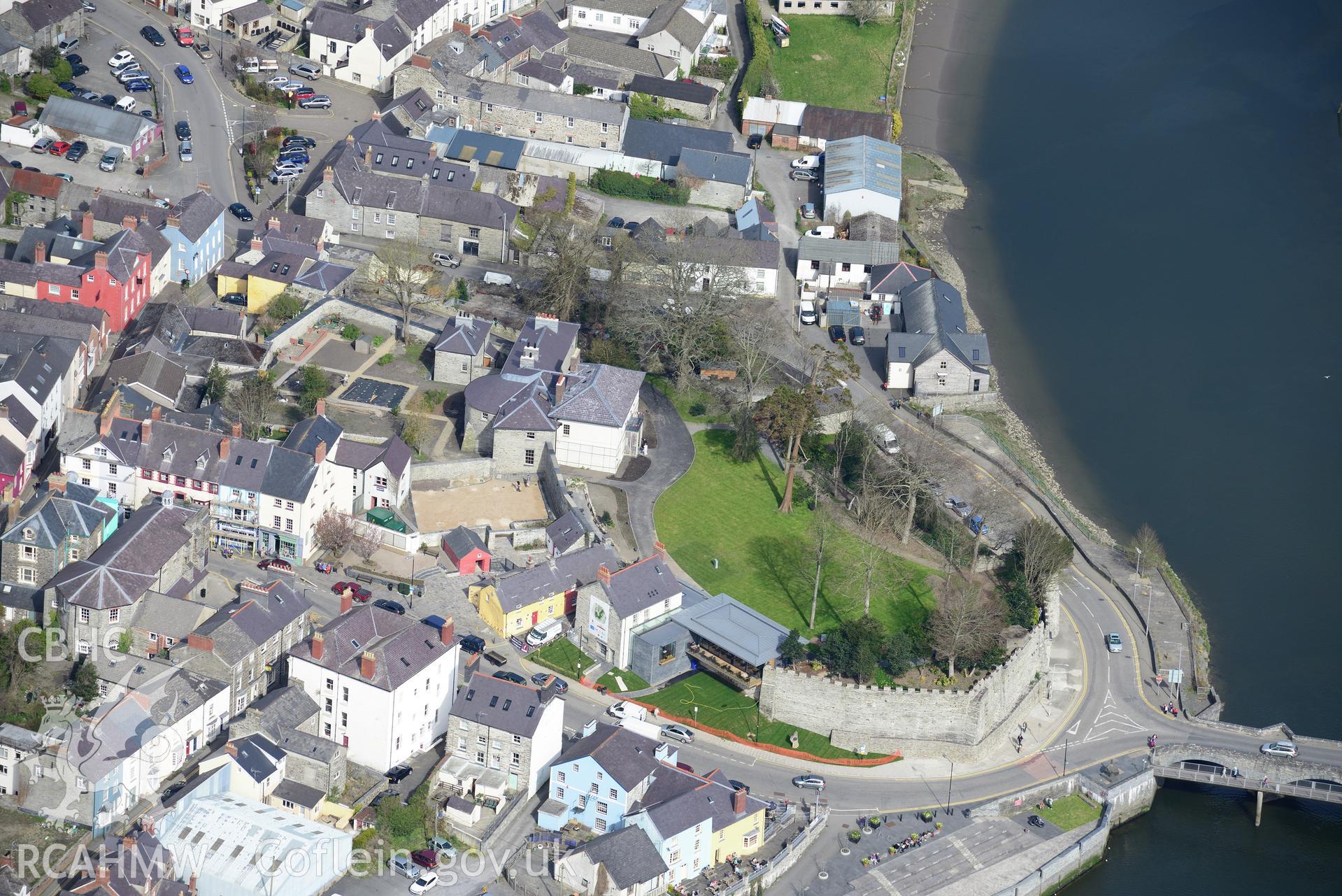 Cardigan Town, Castle, Castle House and Old Shire Hall.. Oblique aerial photograph taken during the Royal Commission's programme of archaeological aerial reconnaissance by Toby Driver 15th April 2015.