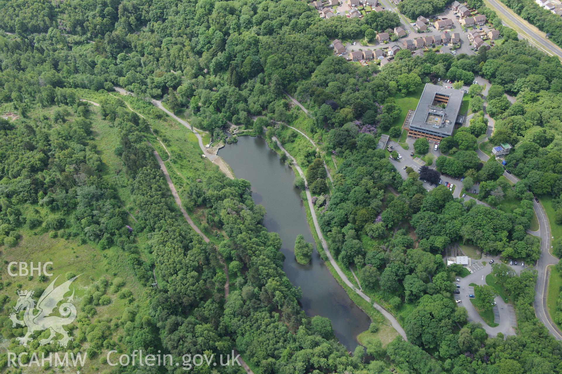 The Equatorial Observatory; Lliw Valley (or Penllergaer) civic centre and the site of Penllergaer House at Penllergaeth Park, Swansea. Oblique aerial photograph taken during the Royal Commission's programme of archaeological aerial reconnaissance by Toby Driver on 19th June 2015.